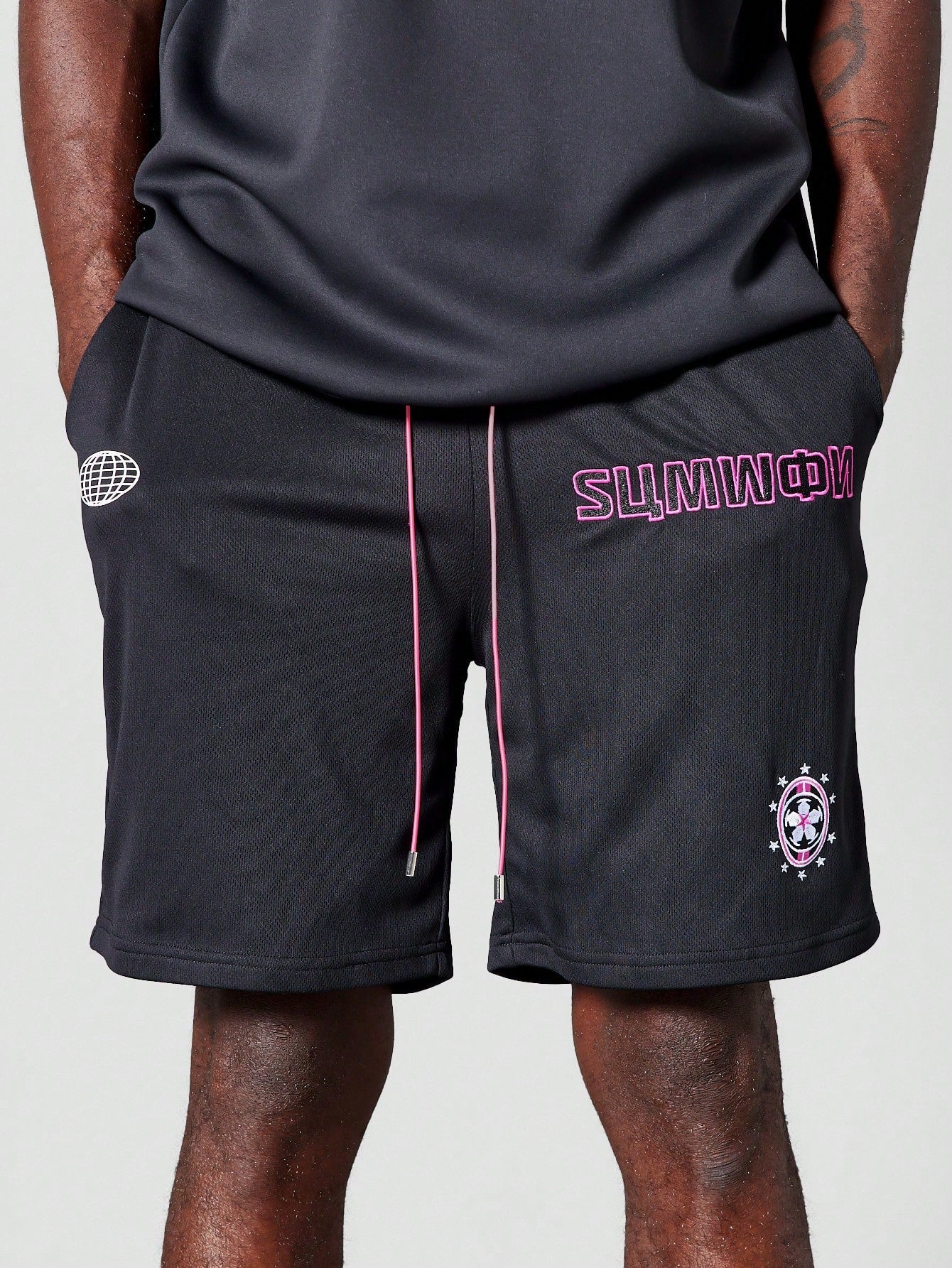 Mesh Shorts With Front Graphic And Badges