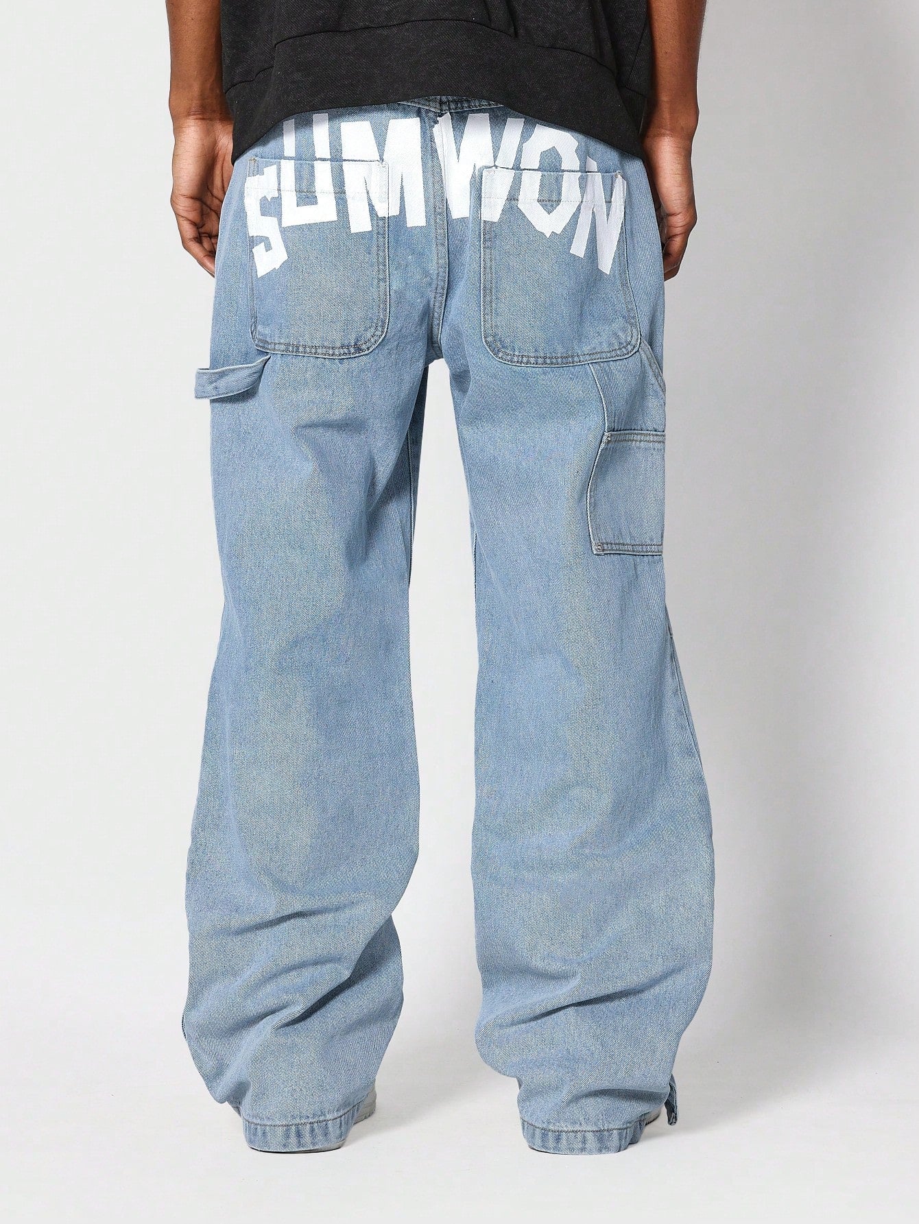 Loose Fit Baggy Carpenter Jeans With Back Graphic