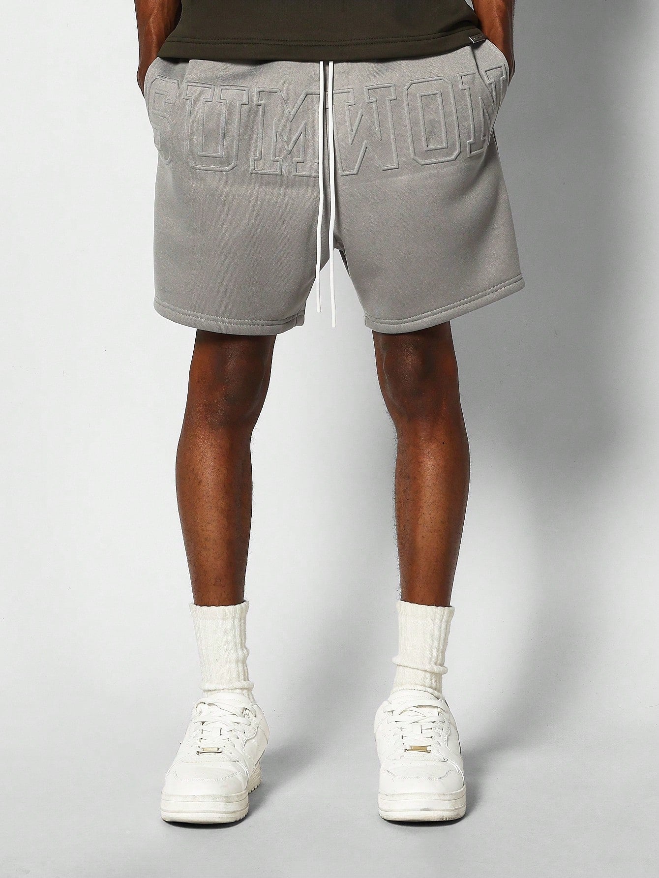 Drop Crotch Short With Embossed Graphic