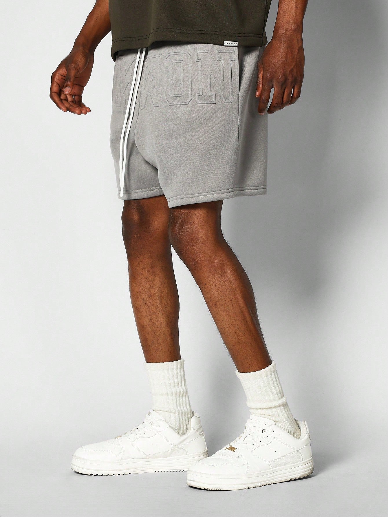 Drop Crotch Short With Embossed Graphic