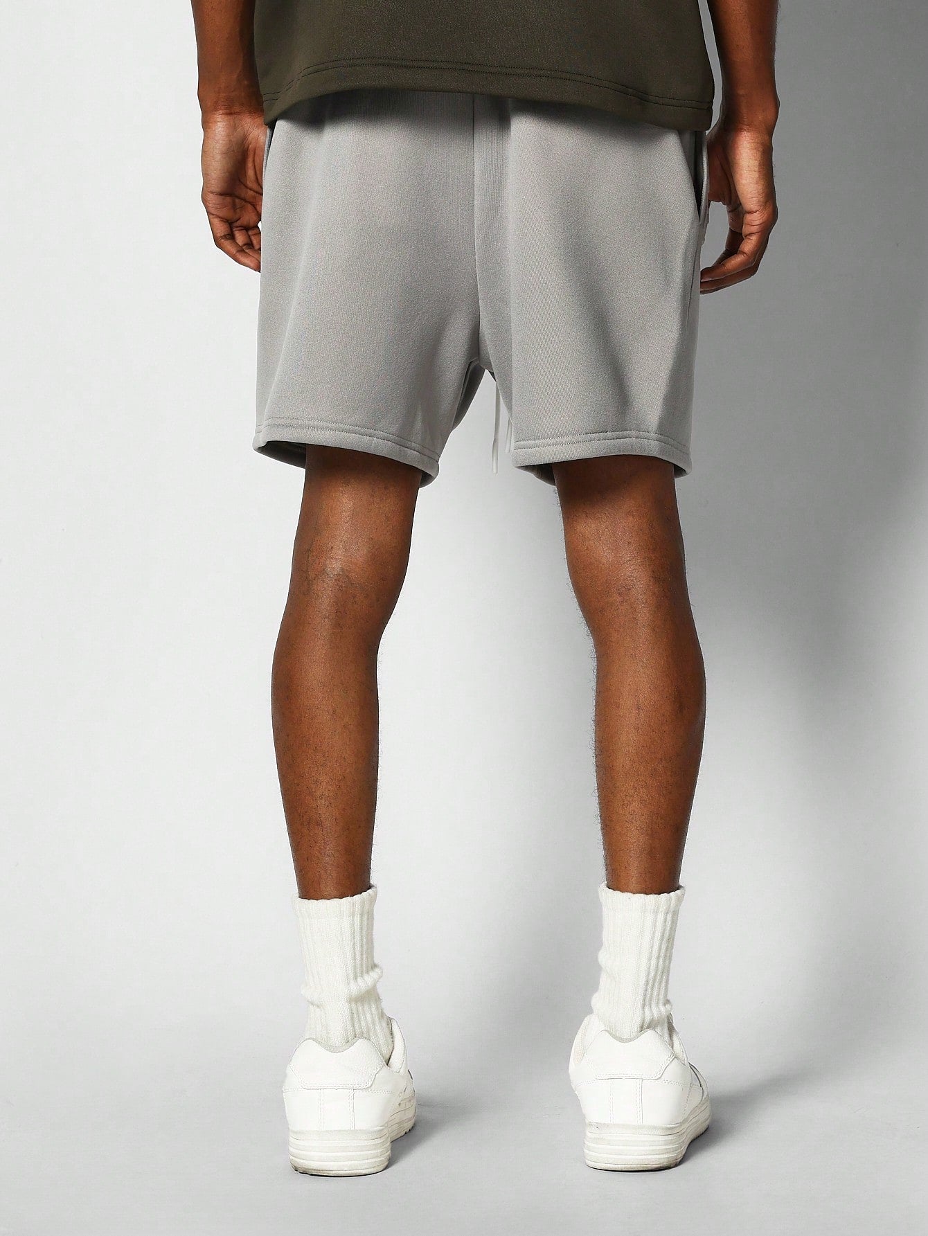 Drop Crotch Short With Embossed Graphic