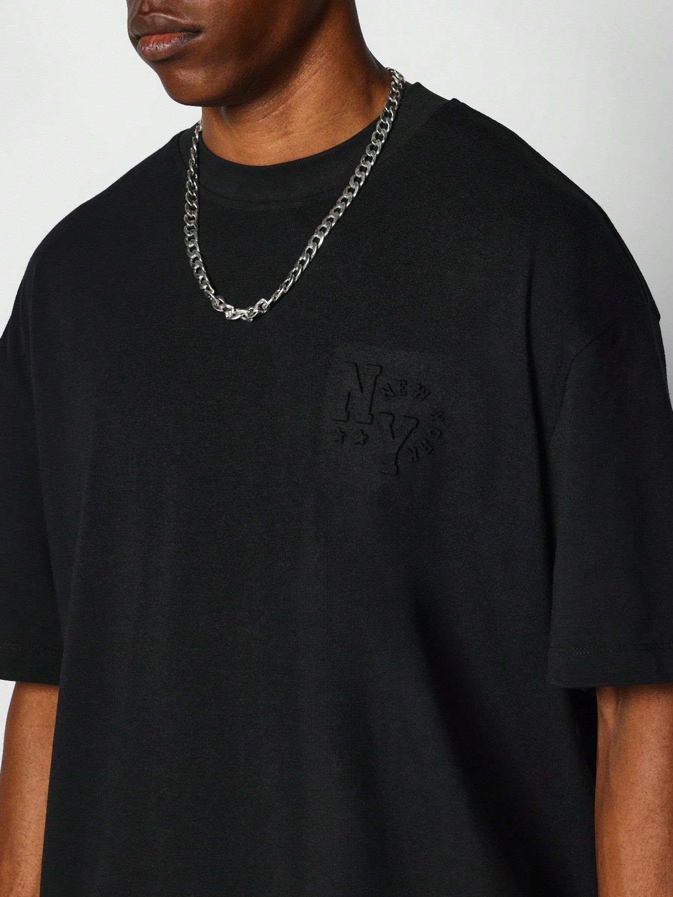 Oversized Crew Neck Tee With Front And Back Embossed Graphic Print