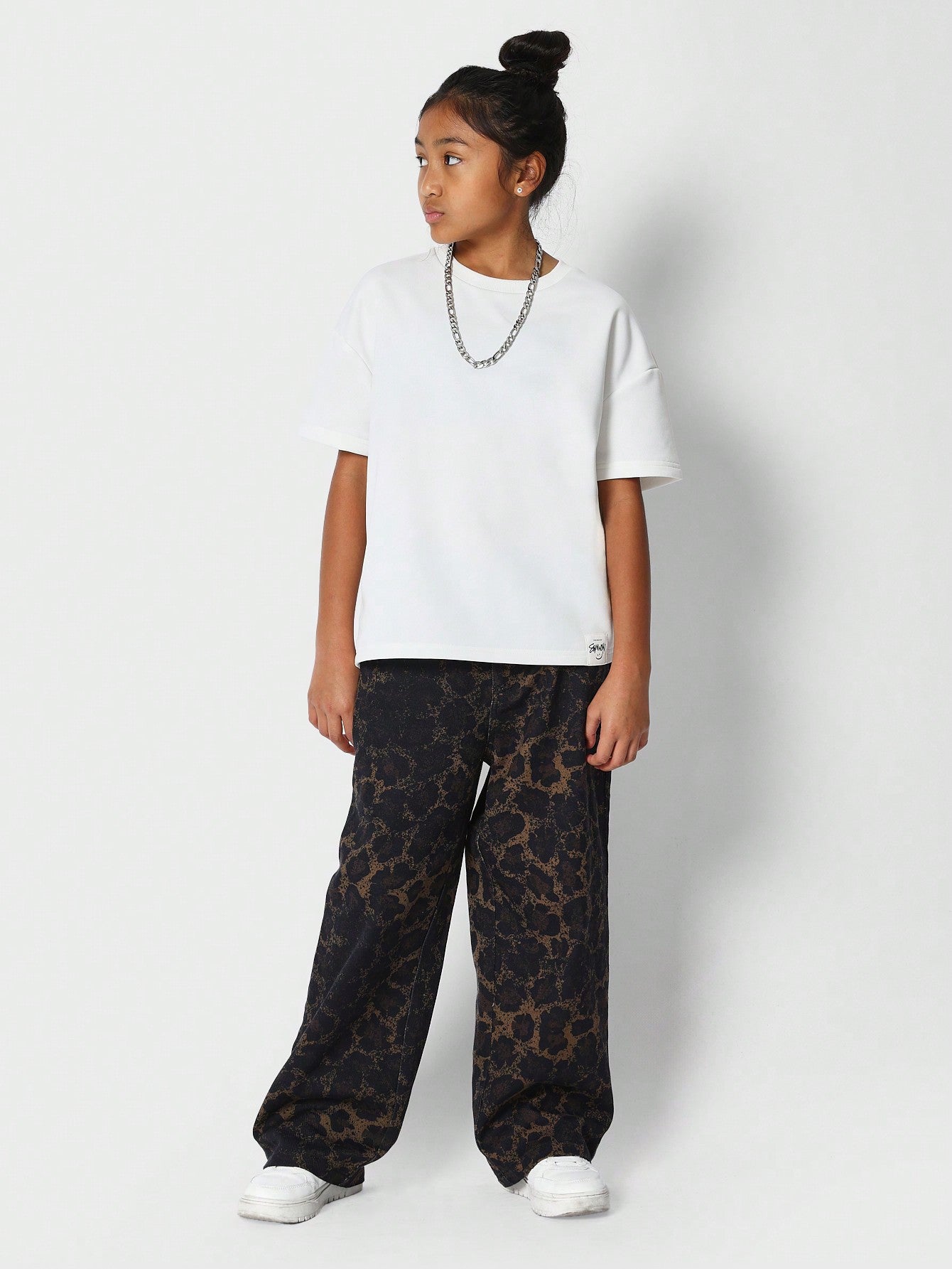 Tween Girls Flared Fit Carpenter Jean With All Over Leopard Print