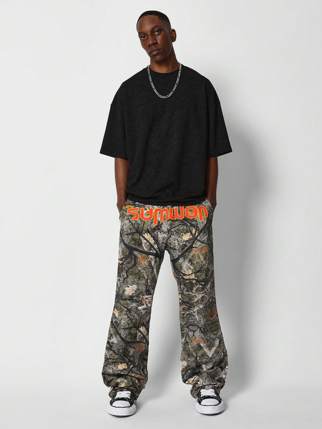 Loose Fit All Over Camo Pant With Front Print