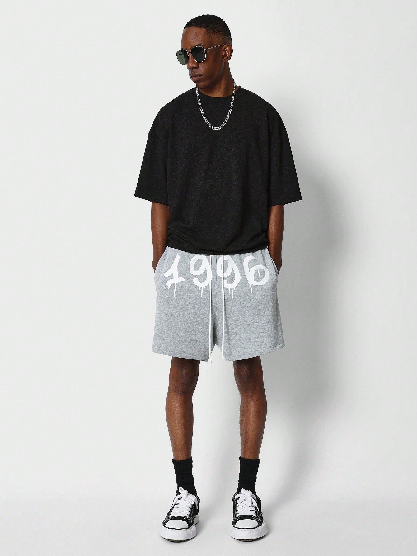 Drop Crotch Shorts With Year Graphic