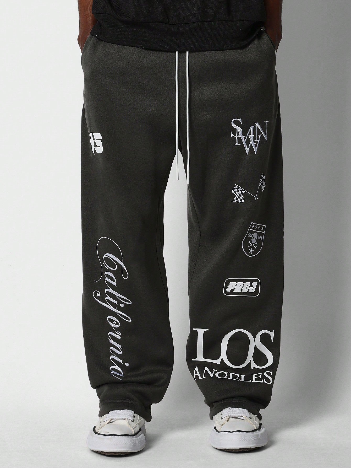 Loose Fit Baggy Drop Crotch Jogger Pants With Multi Patch Graphic