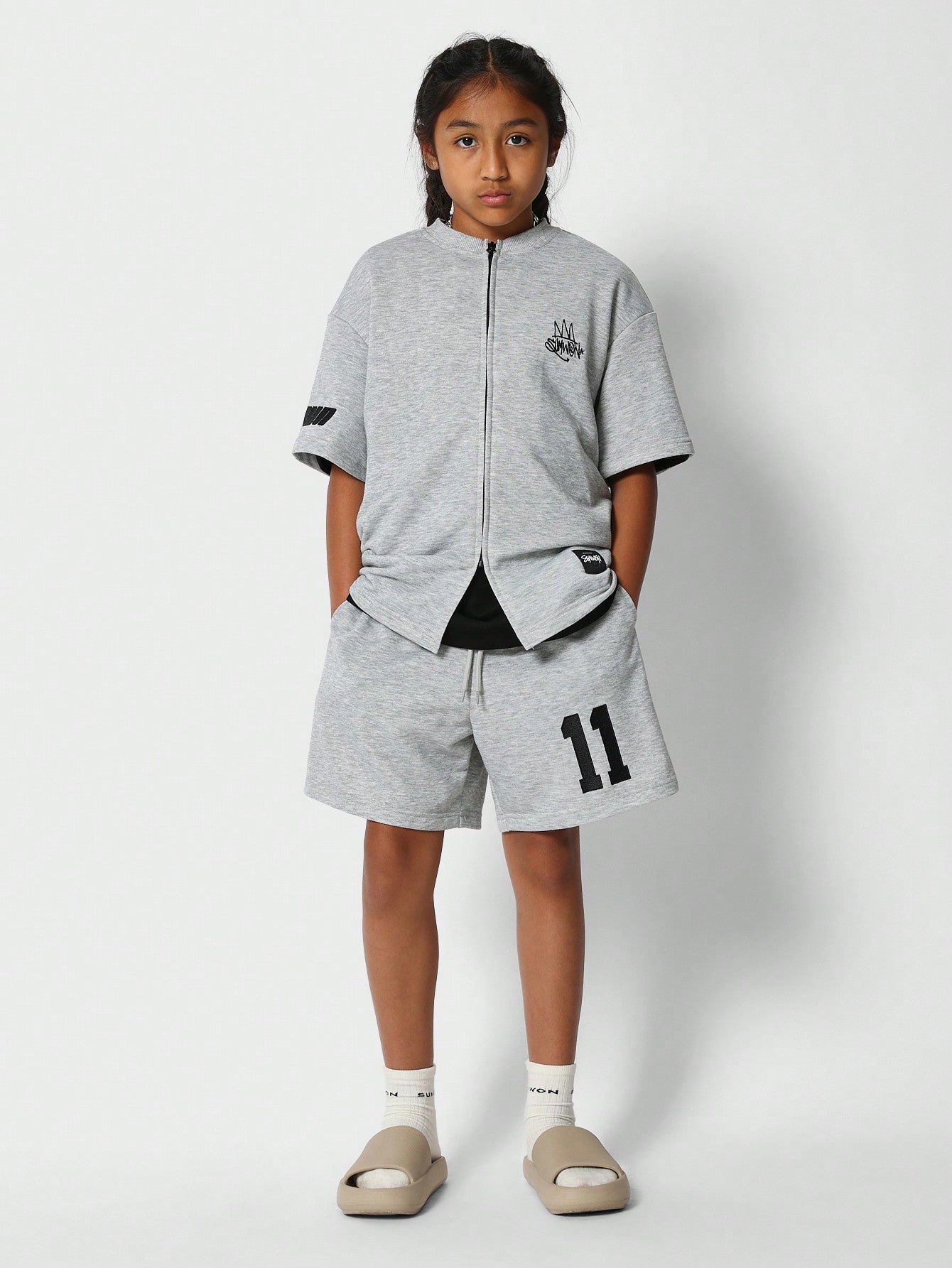 Tween Girls Oversized Fit Zip Tee With Number Print And Drop Crotch Short 2 Piece Set