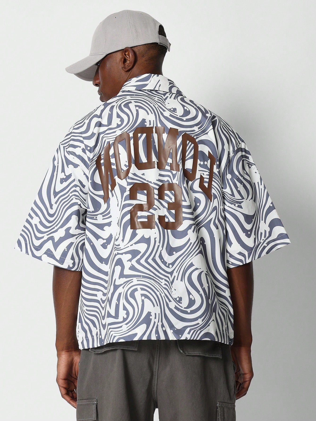 Zip Through Nylon Shirt With All Over Animal And Number Graphic Print