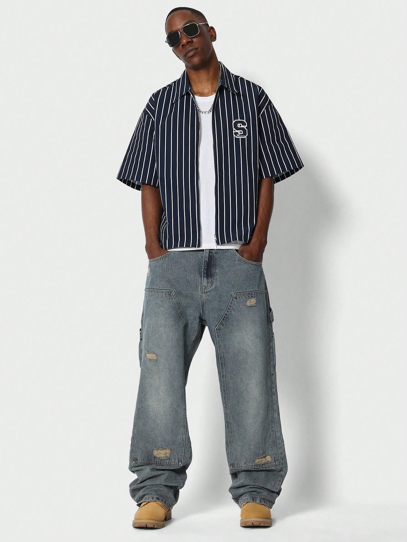 Loose Fit Baggy Carpenter Jeans With Distressing Detail