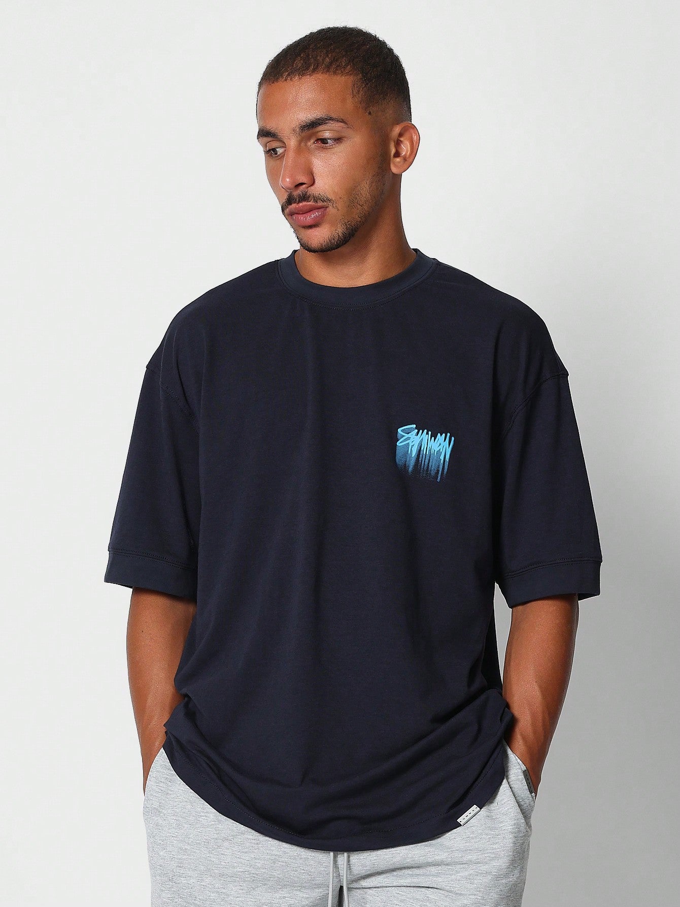 Oversized Short Sleeve Tee With Graffiti Graphic Print