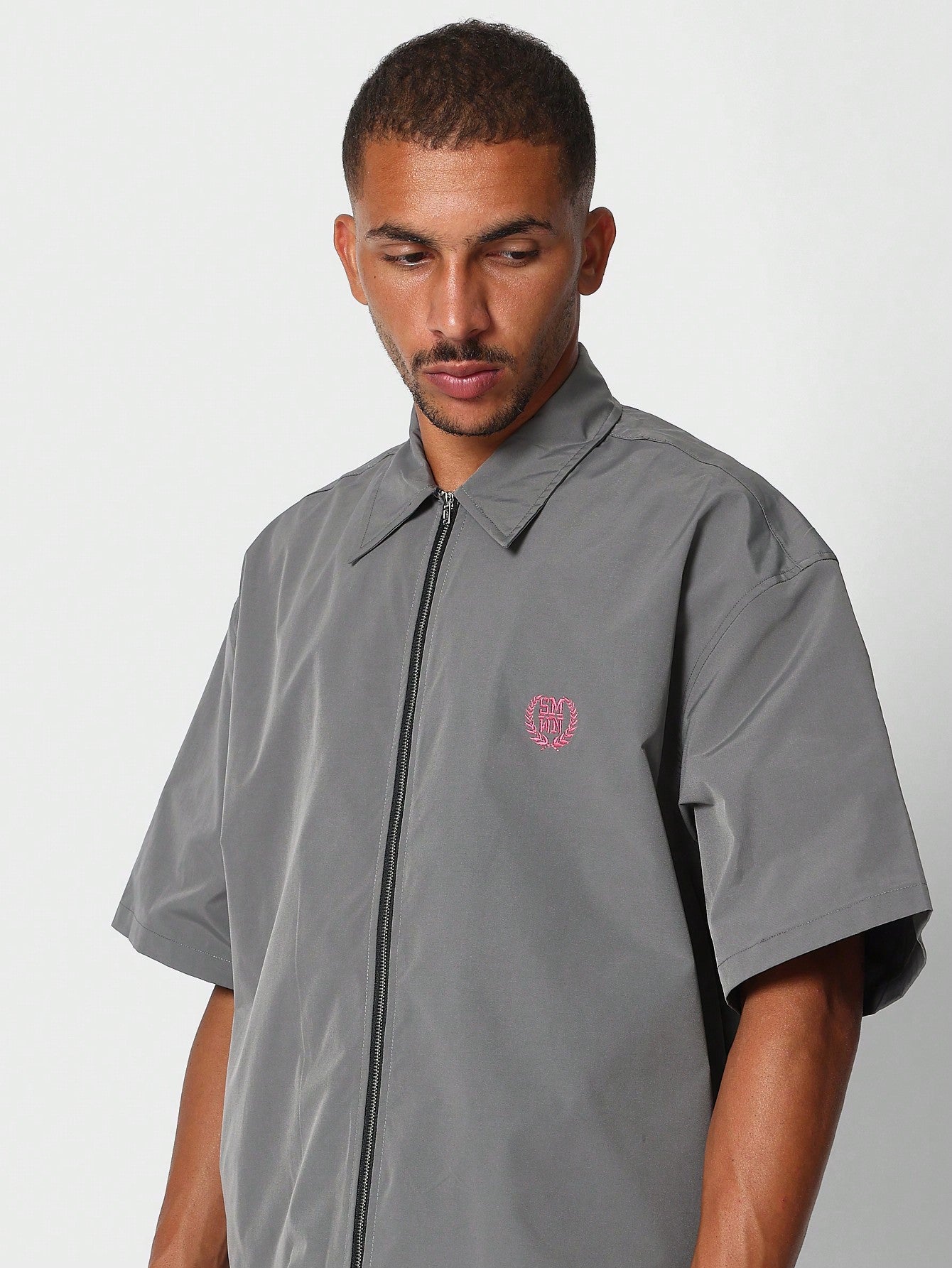 Boxy Fit Zip Through Shirt With Back Signature Logo Graphic Print