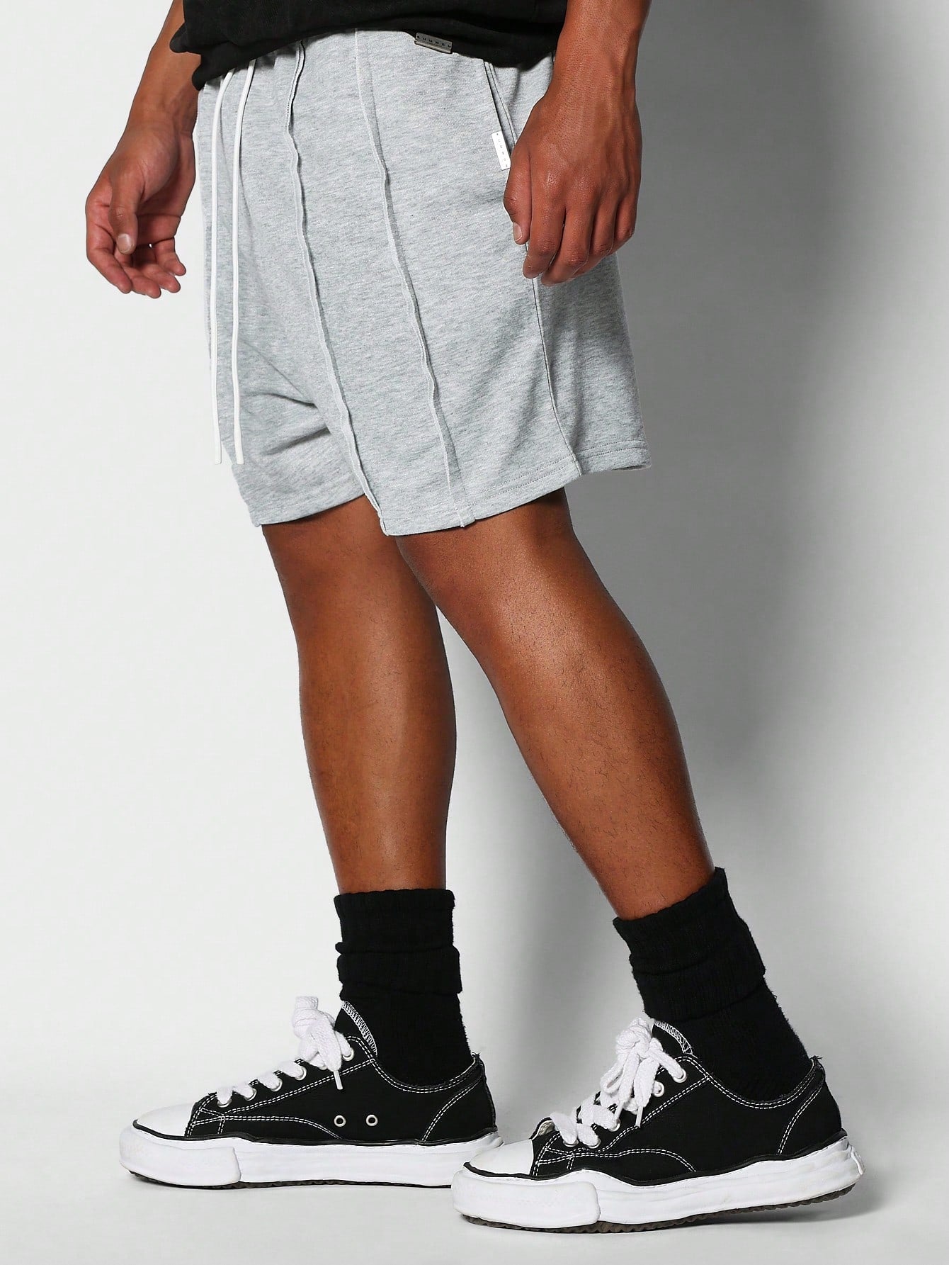 Drop Crotch Short With Exposed Seam