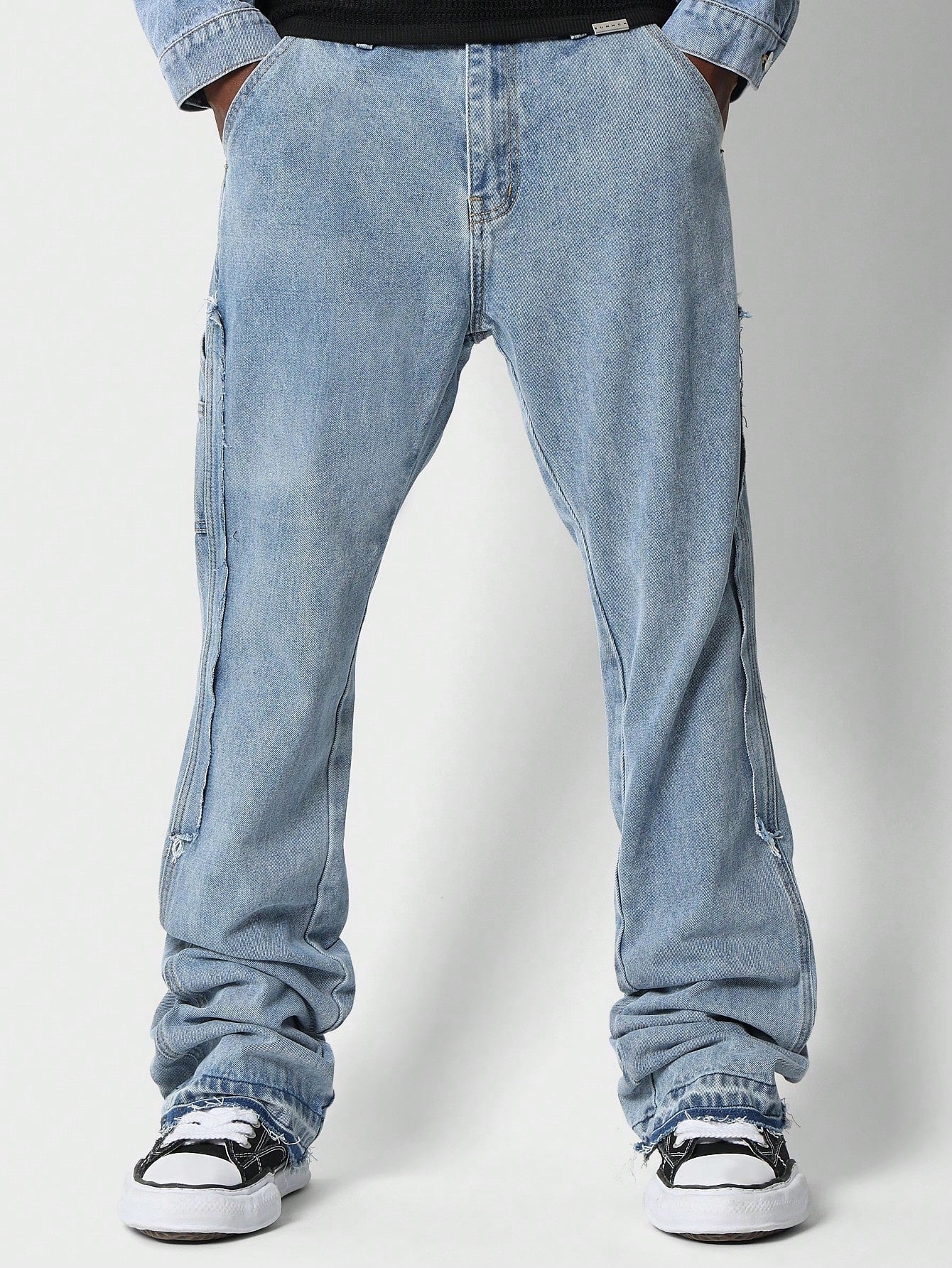 Flare Fit Jean With Back Raw Edge Applique Detail