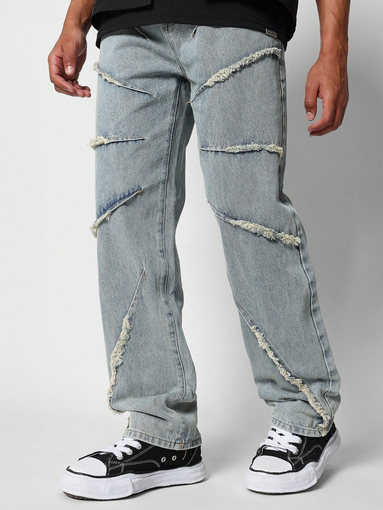 Flare Fit Jean With Raw Edge Seam Detail