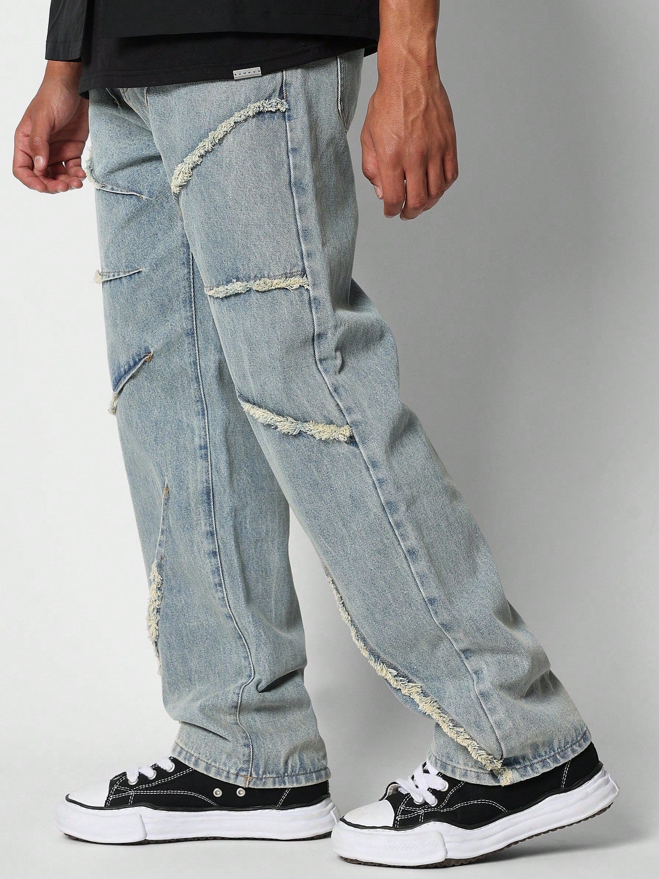 Flare Fit Jean With Raw Edge Seam Detail