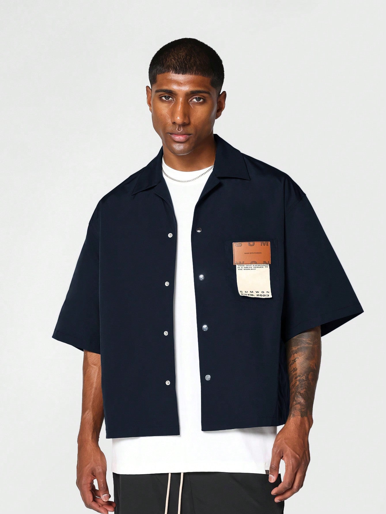 Boxy Fit Shirt With Badge Pocket And Back Graphic Print