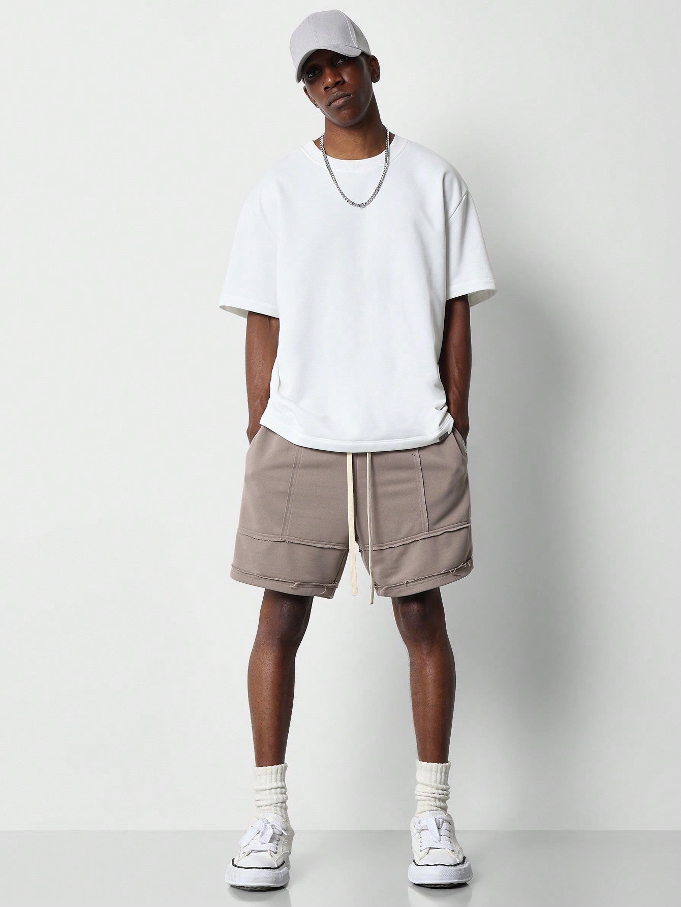 Drop Crotch Short With Exposed Seam Detail