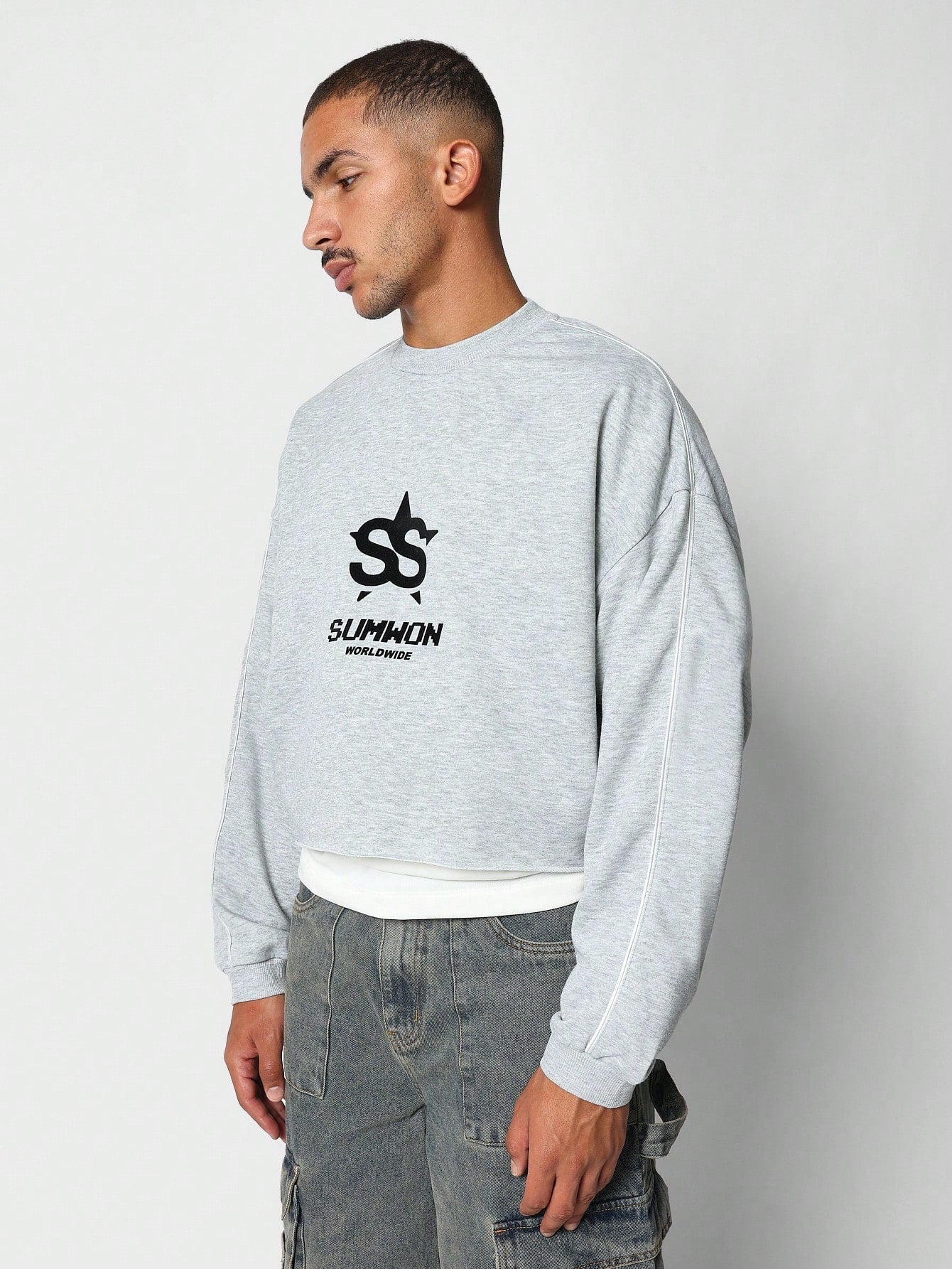 Crop Fit Sweatshirt With Raw Hem And Piping Detail