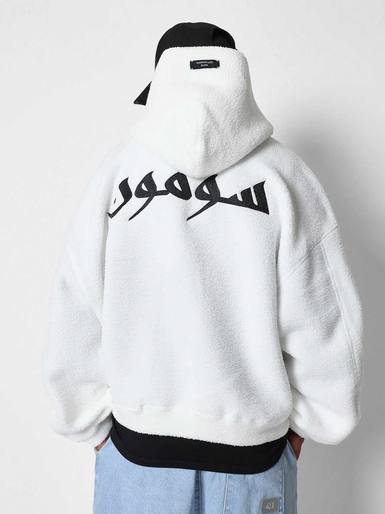 Oversized Fit Zip Through Fleece Hoodie With Back Arabic Letter Graphic Print