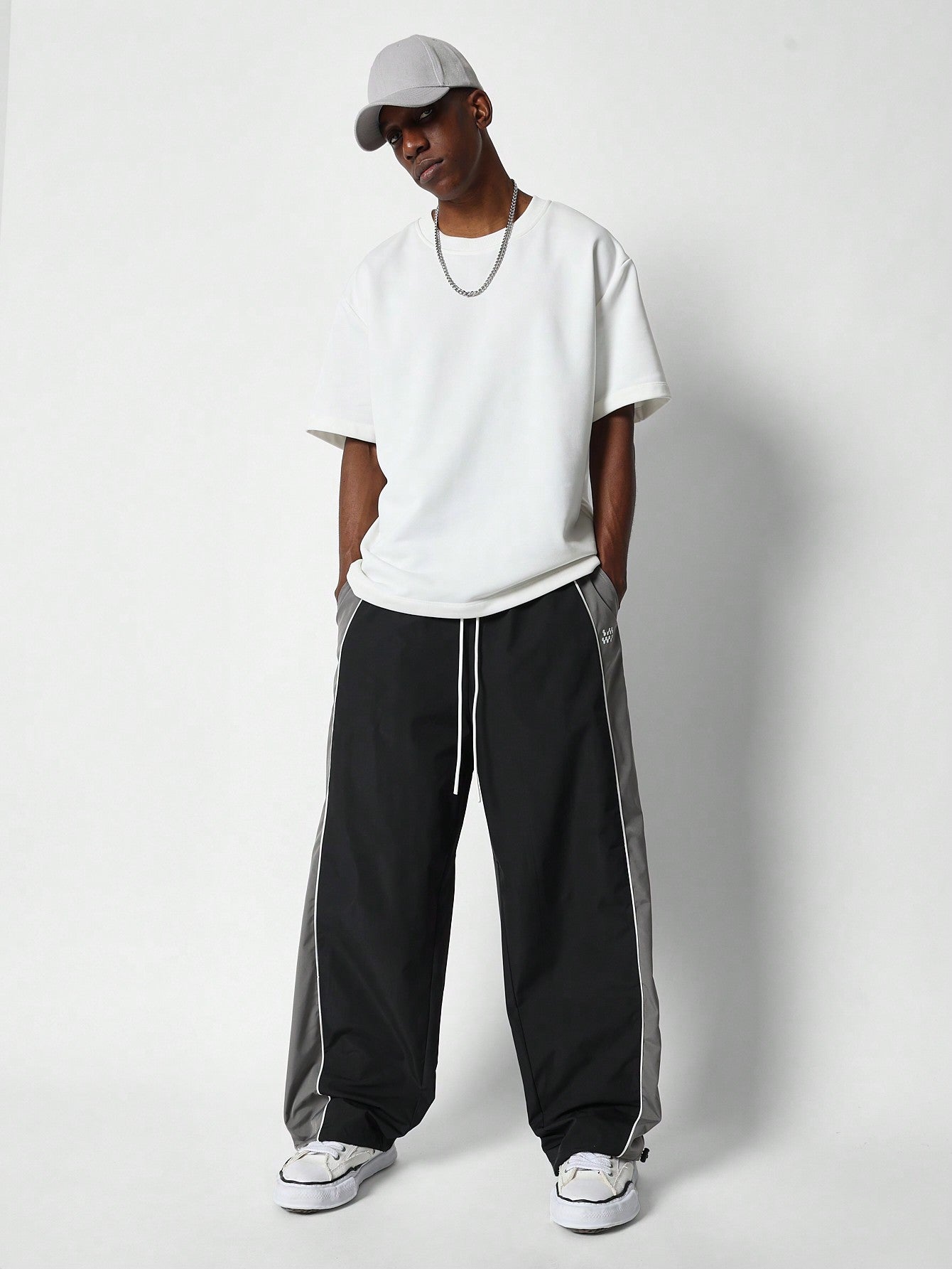 Loose Fit Baggy Colour Block Slit Parachute Pant With Piping Detail