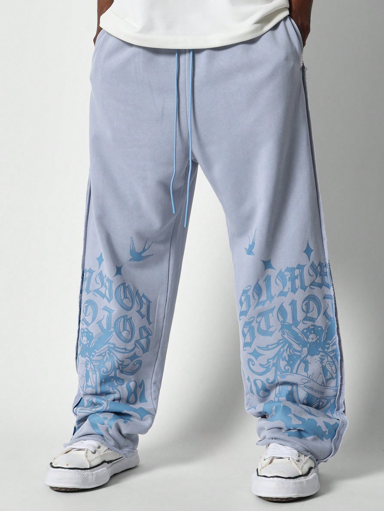 Drop Crotch Raw Edge Jogger With Exposed Seam & Graphic Print