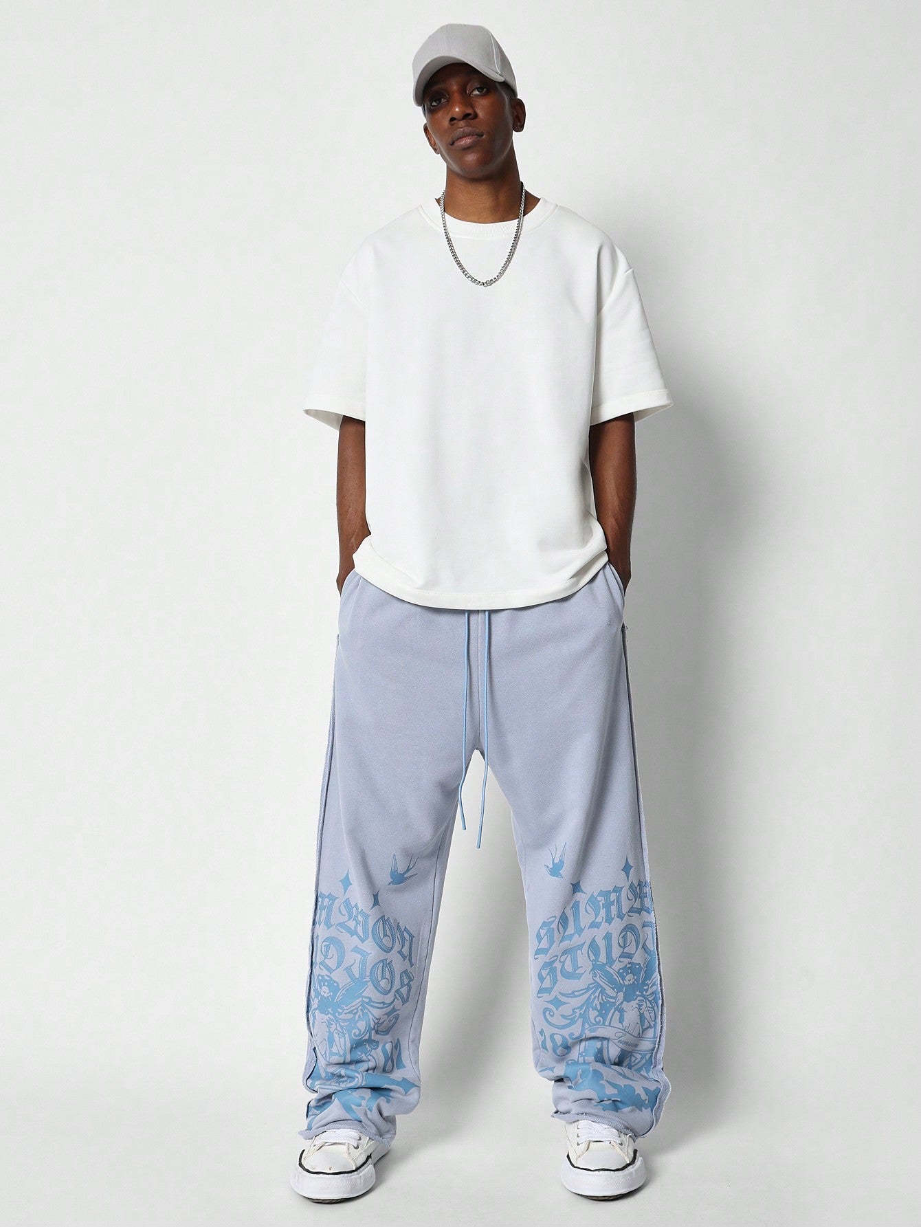 Drop Crotch Raw Edge Jogger With Exposed Seam & Graphic Print