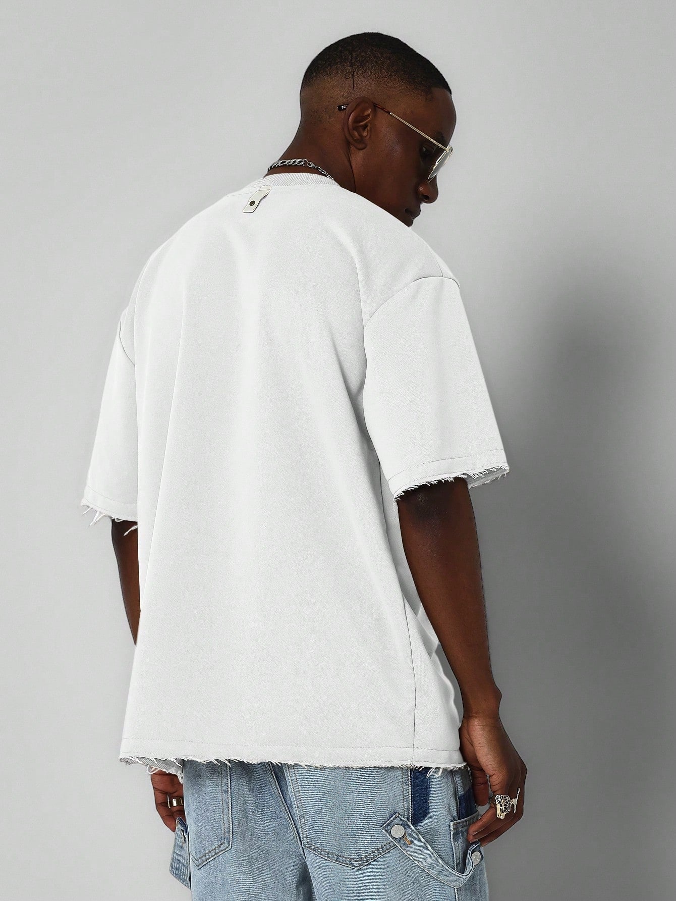 Tee With Patch Pocket And Raw Hem Detail