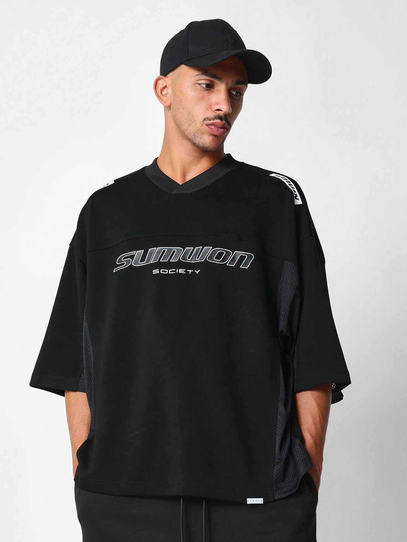 Oversized Fit Multi Panel Mesh Tee With Front Graphic Print & Back Mesh Number Applique