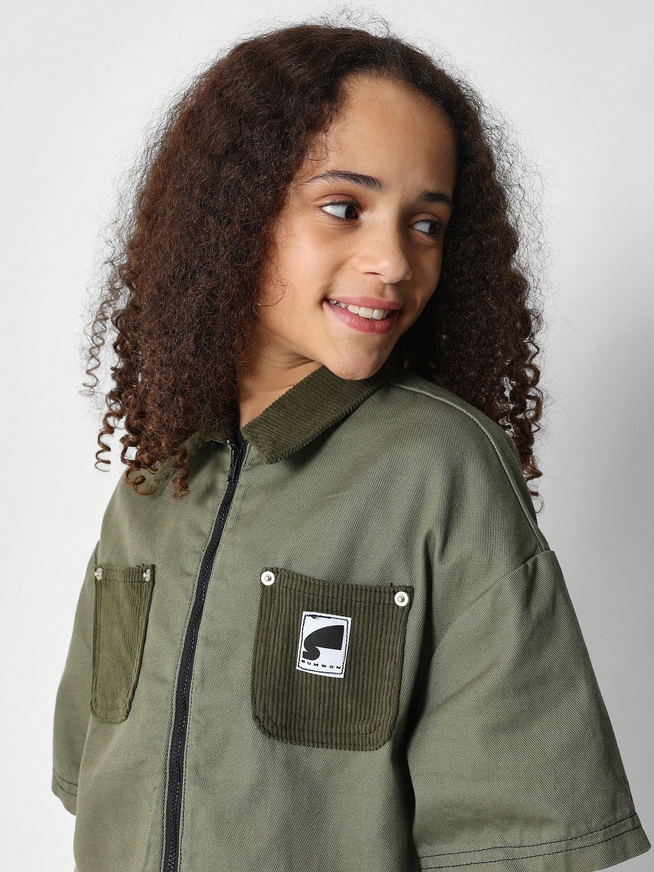 Tween Girls Woven Boxy Fit Zip Through Shirt With Corduroy Contrast Collar & Pockets And Number Graphic Print