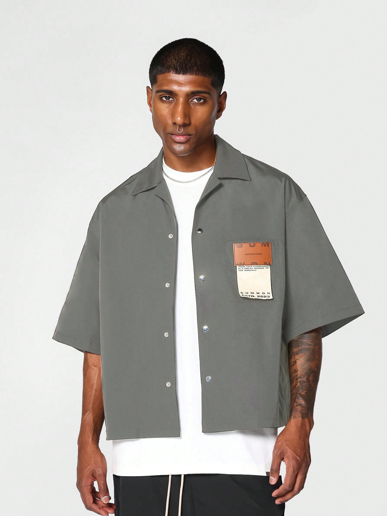 Boxy Fit Shirt With Badge Pocket And Back Print