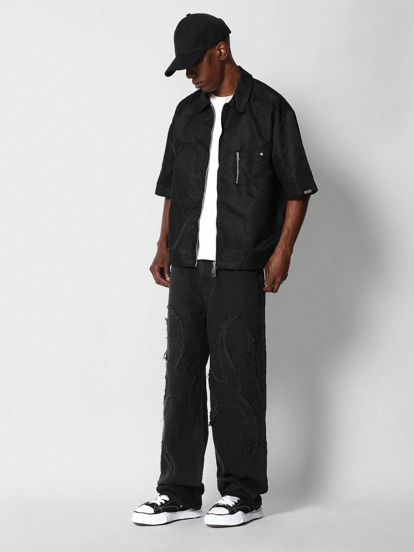 Loose Fit Jean With Exposed Seam Detail