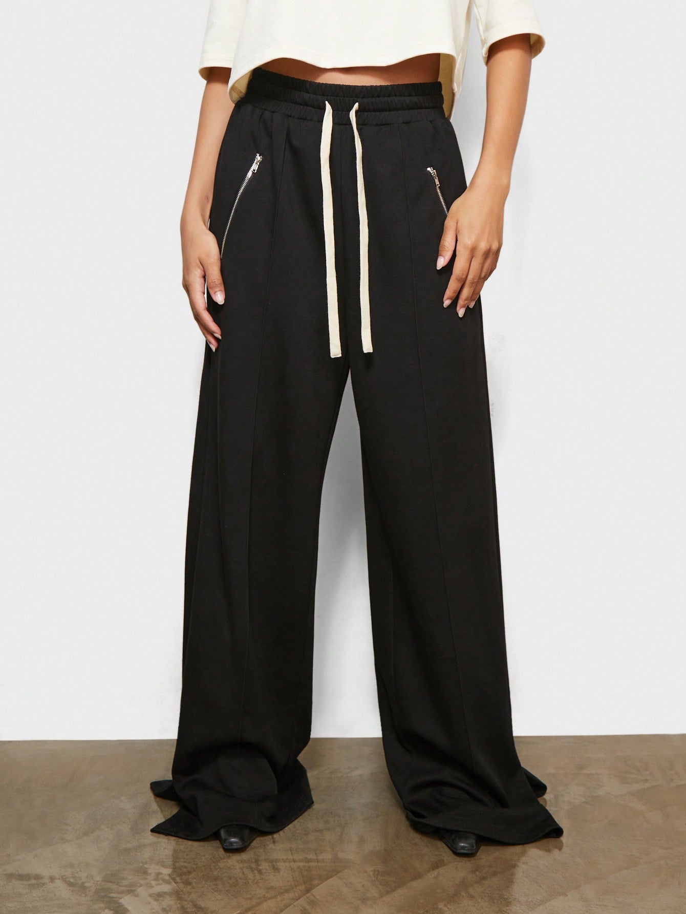 SUMWON WOMEN Straight Fit Sweatpants With Side Slit, Pintucks And Slant Pocket Details