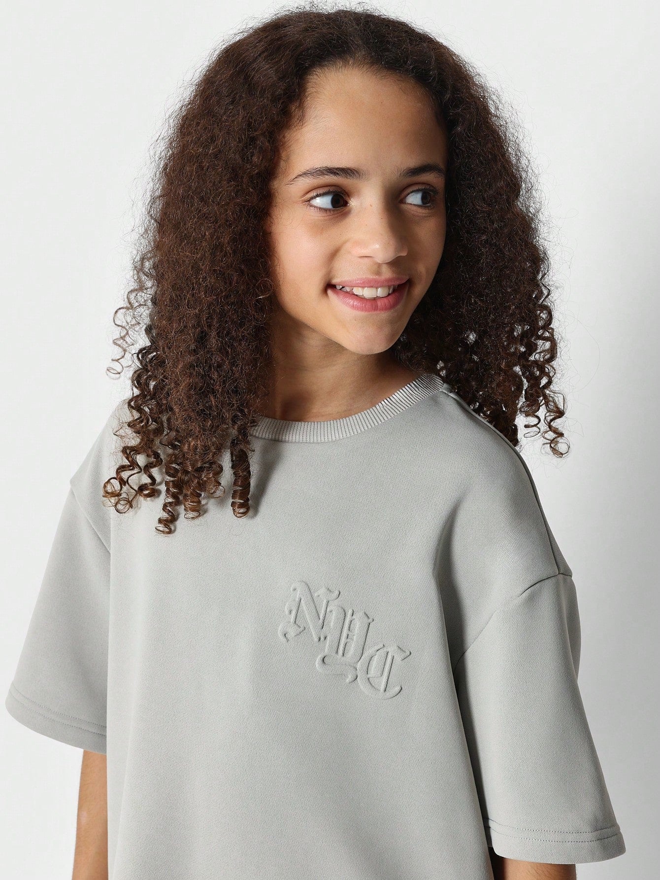 Tween Girls Oversized Drop Shoulder Tee With Back Emboss Graphic