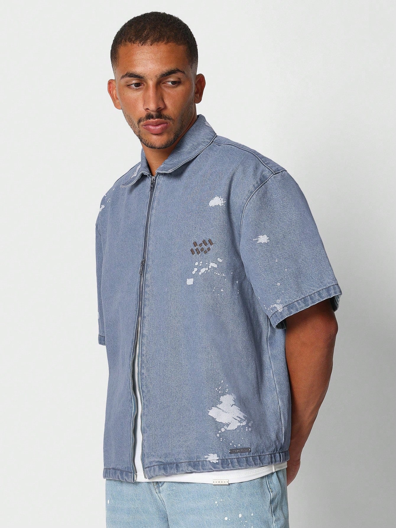 Boxy Fit Zip Through Denim Shirt With All Over Paint And Back Graphic Print