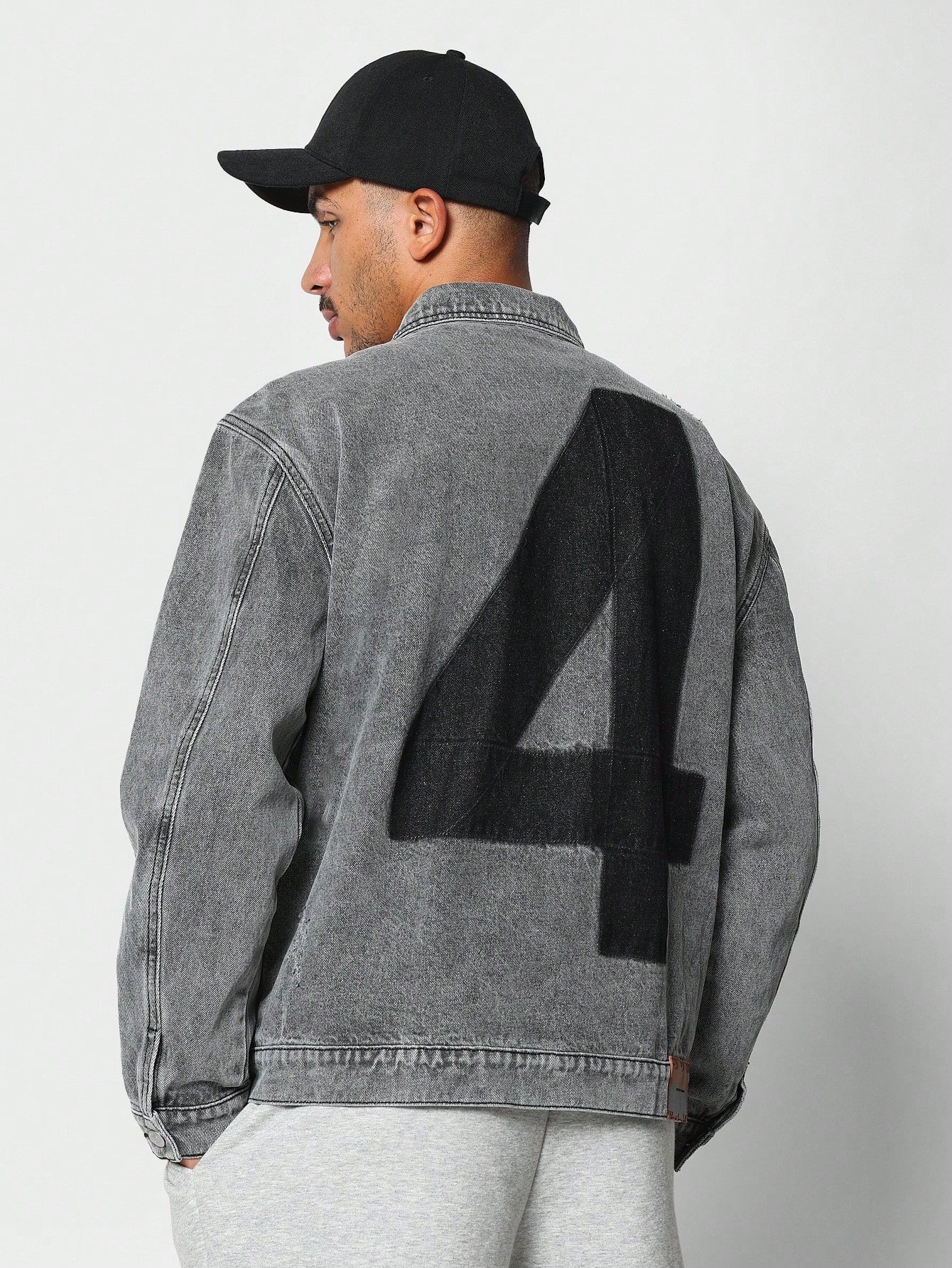 Washed Denim Trucker Jacket With Number 4 Graphic Print