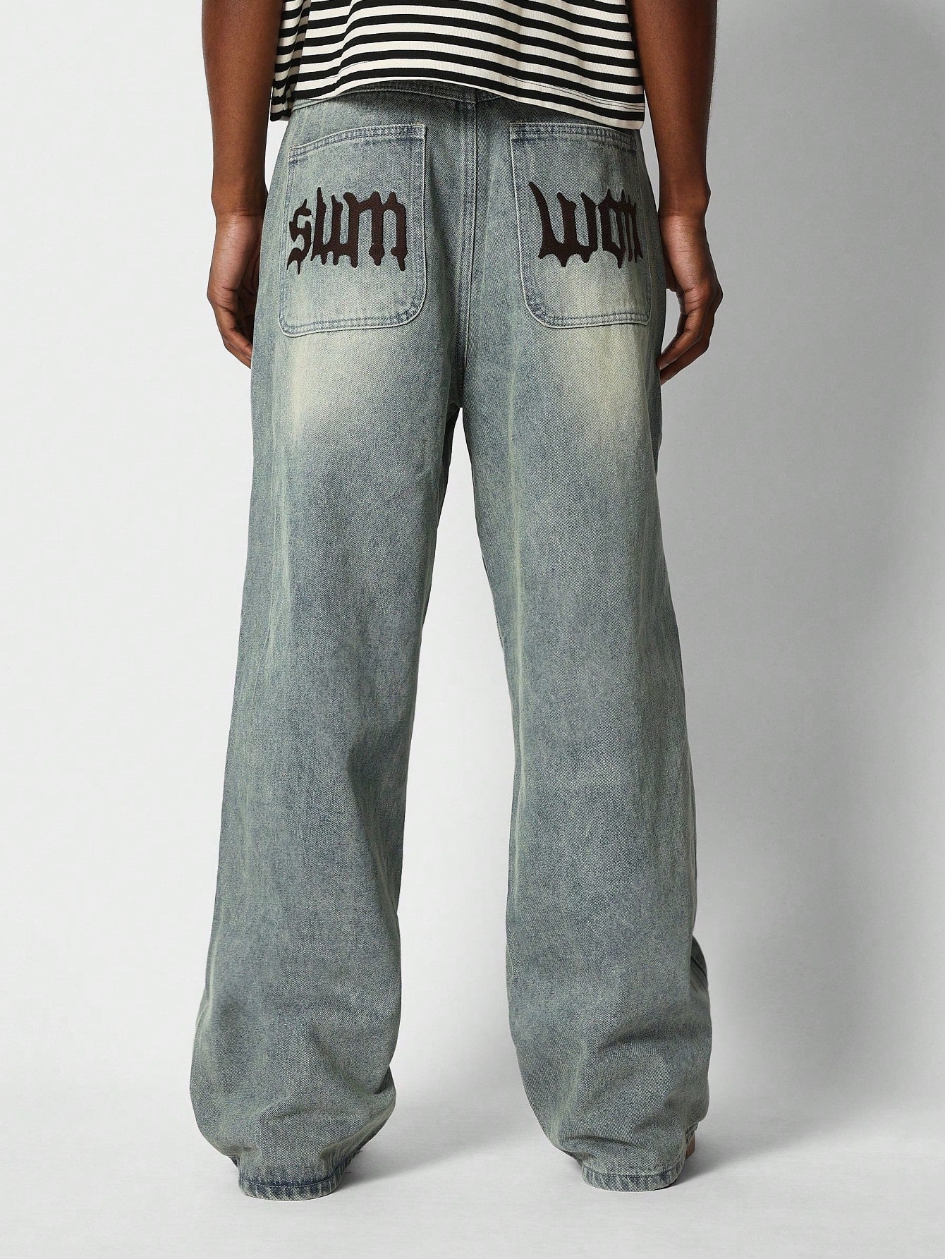 Loose Fit Faded Jean With Panelled Seam And Letter Graphic Print