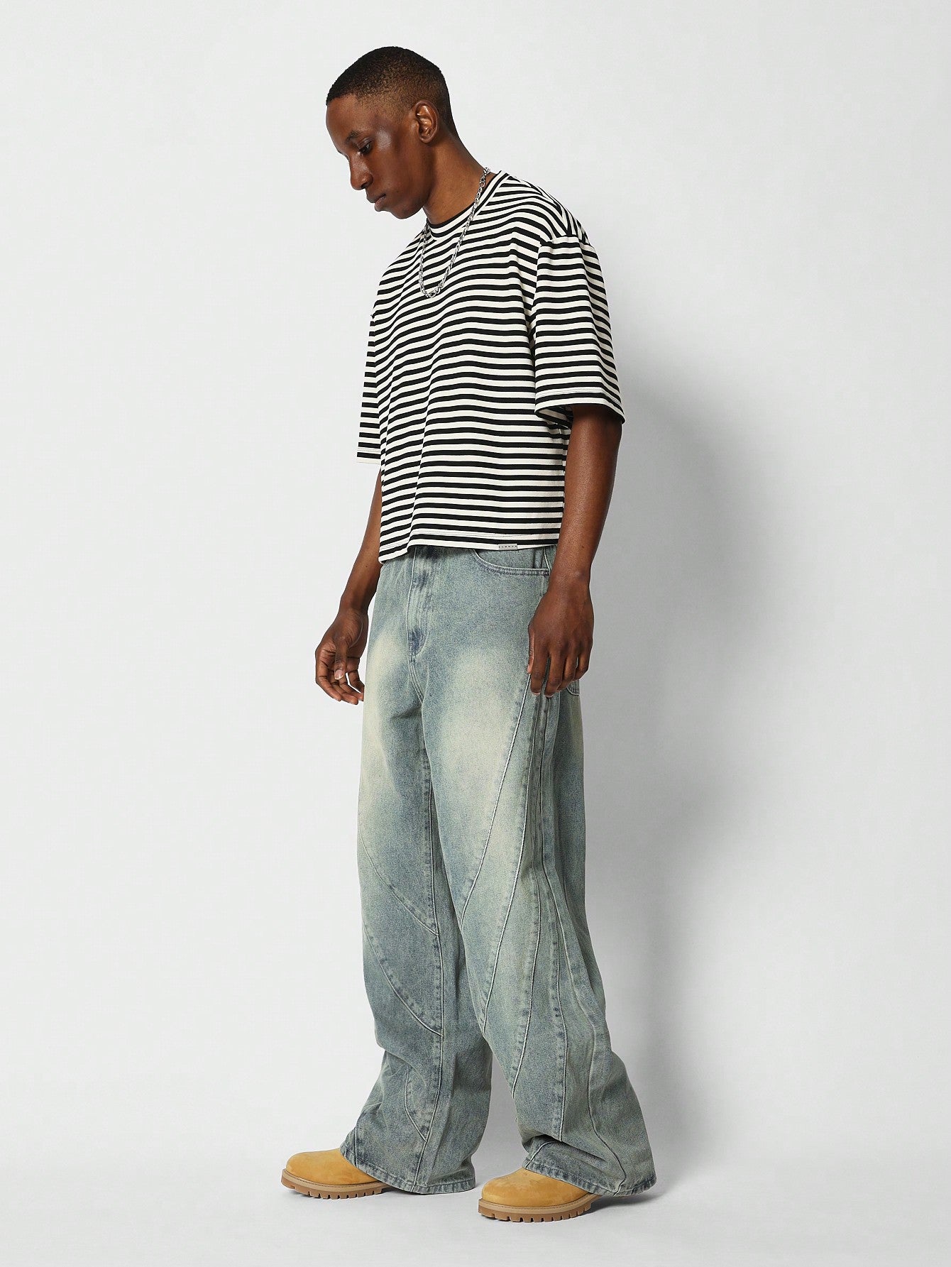 Loose Fit Faded Jean With Panelled Seam And Letter Graphic Print