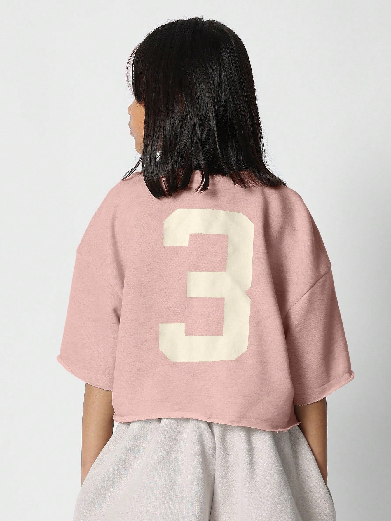 Tween Girls Relaxed Crop Fit Raw Edge Tee With Back Number Graphic Print