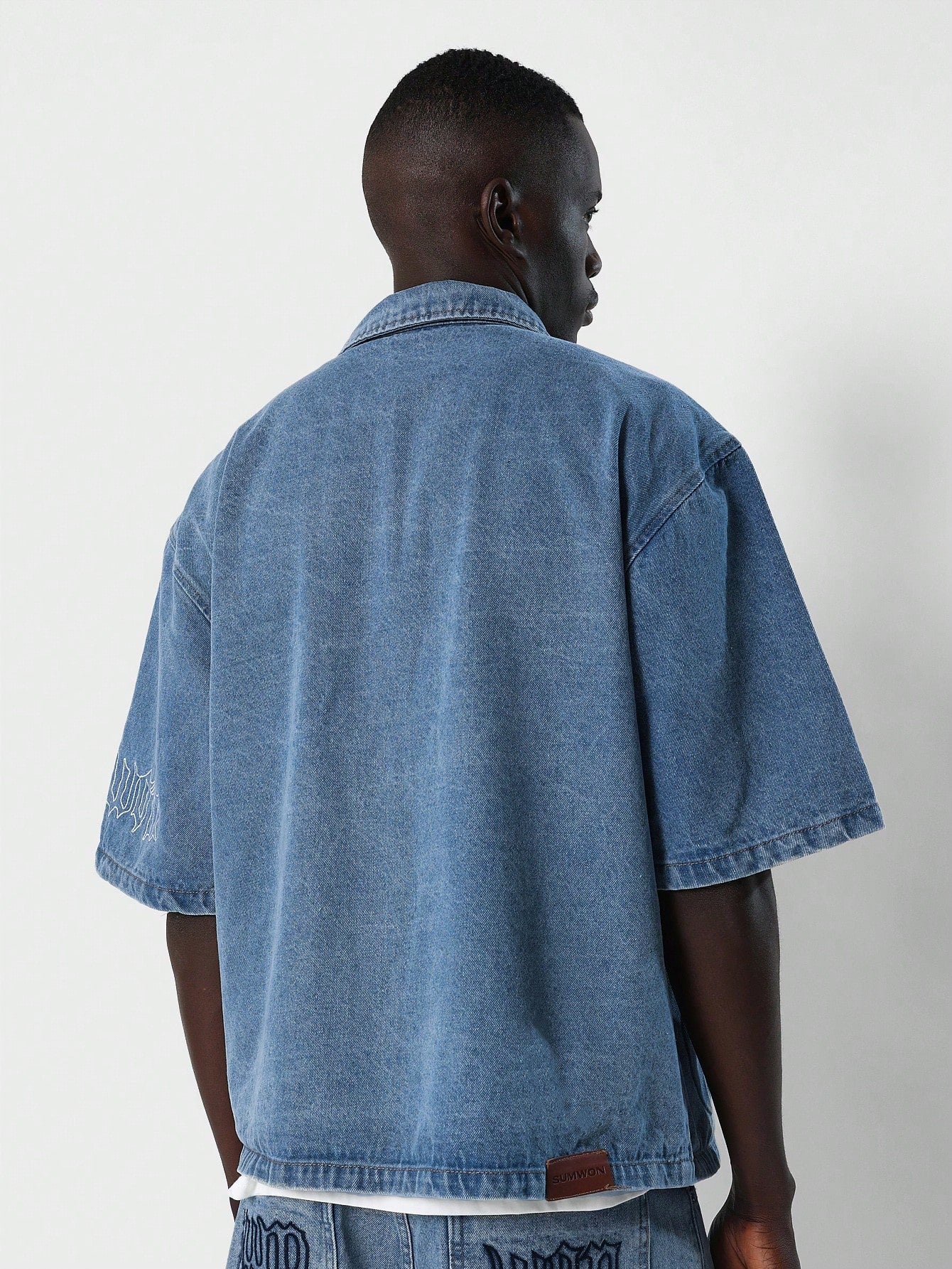 Boxy Fit Denim Shirt With Emboss Design & Sleeve Graphic Print