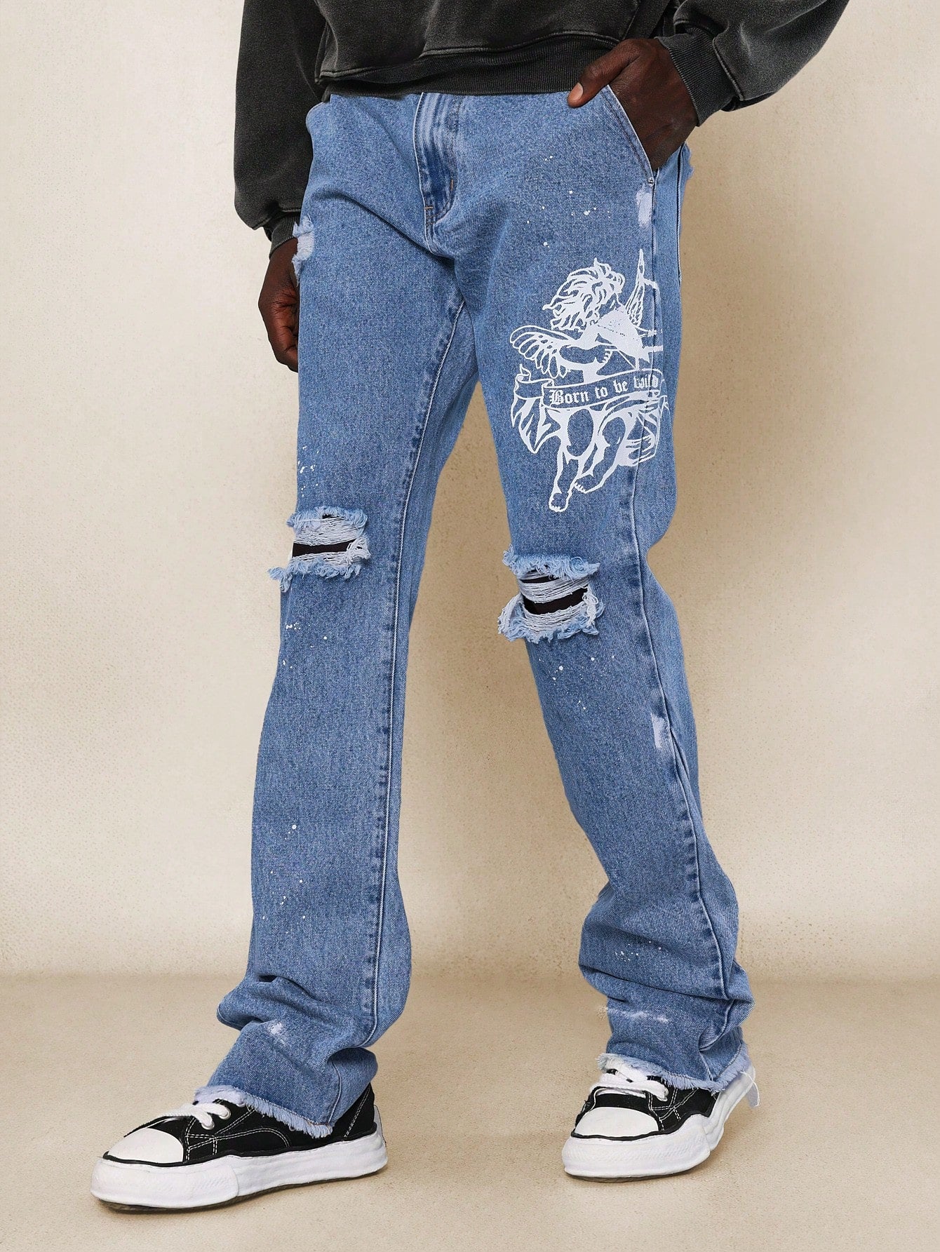 Flare Fit Raw Edge Ripped Jean With Graphic Print