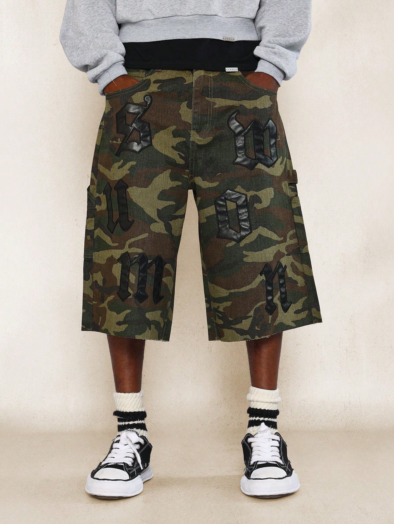 Camo Carpenter Denim Jort With All Over Applique Patches