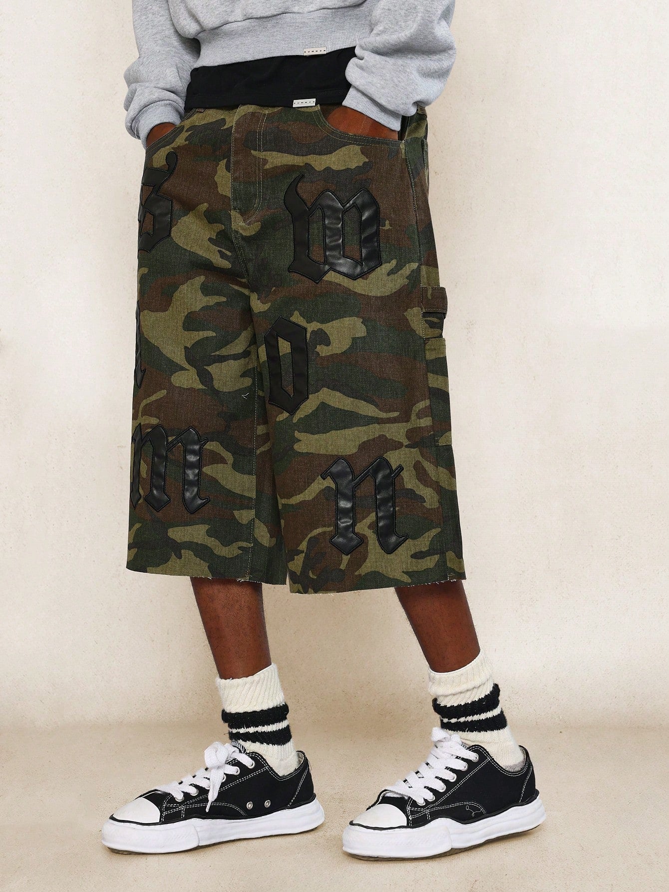 Camo Carpenter Denim Jort With All Over Applique Patches