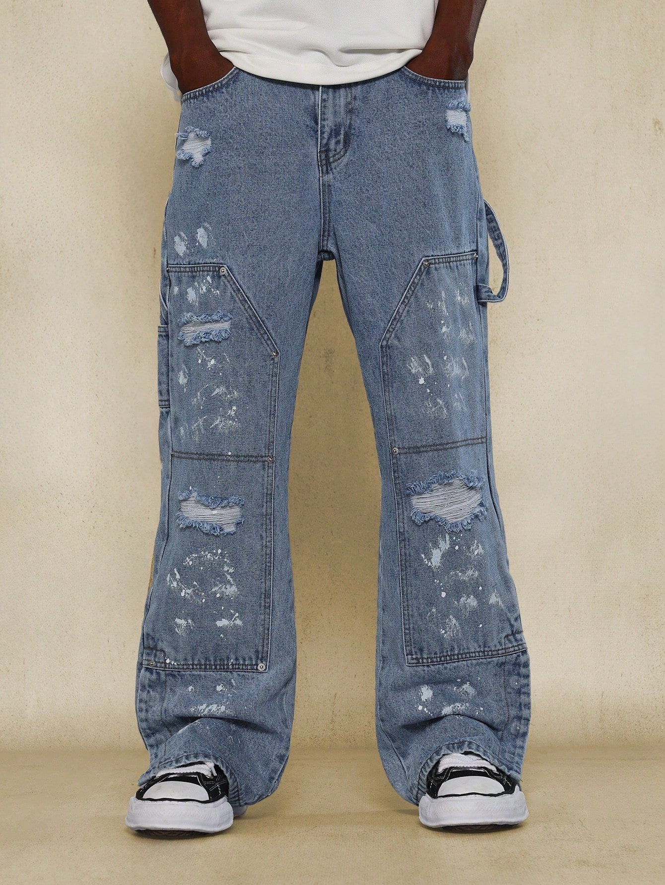 Flare Fit Distressed Carpenter Denim Jean With Splatter Paint & Buttoned Side Split