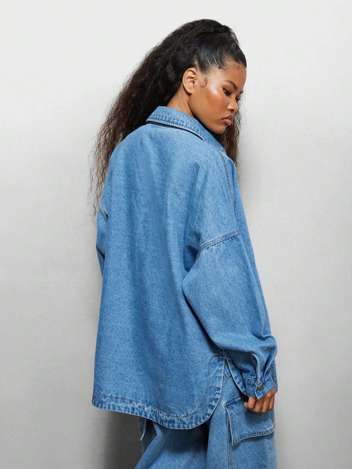 SUMWON WOMEN Oversized Denim Curve Hem Shirt With Front Pocket Emboss Print