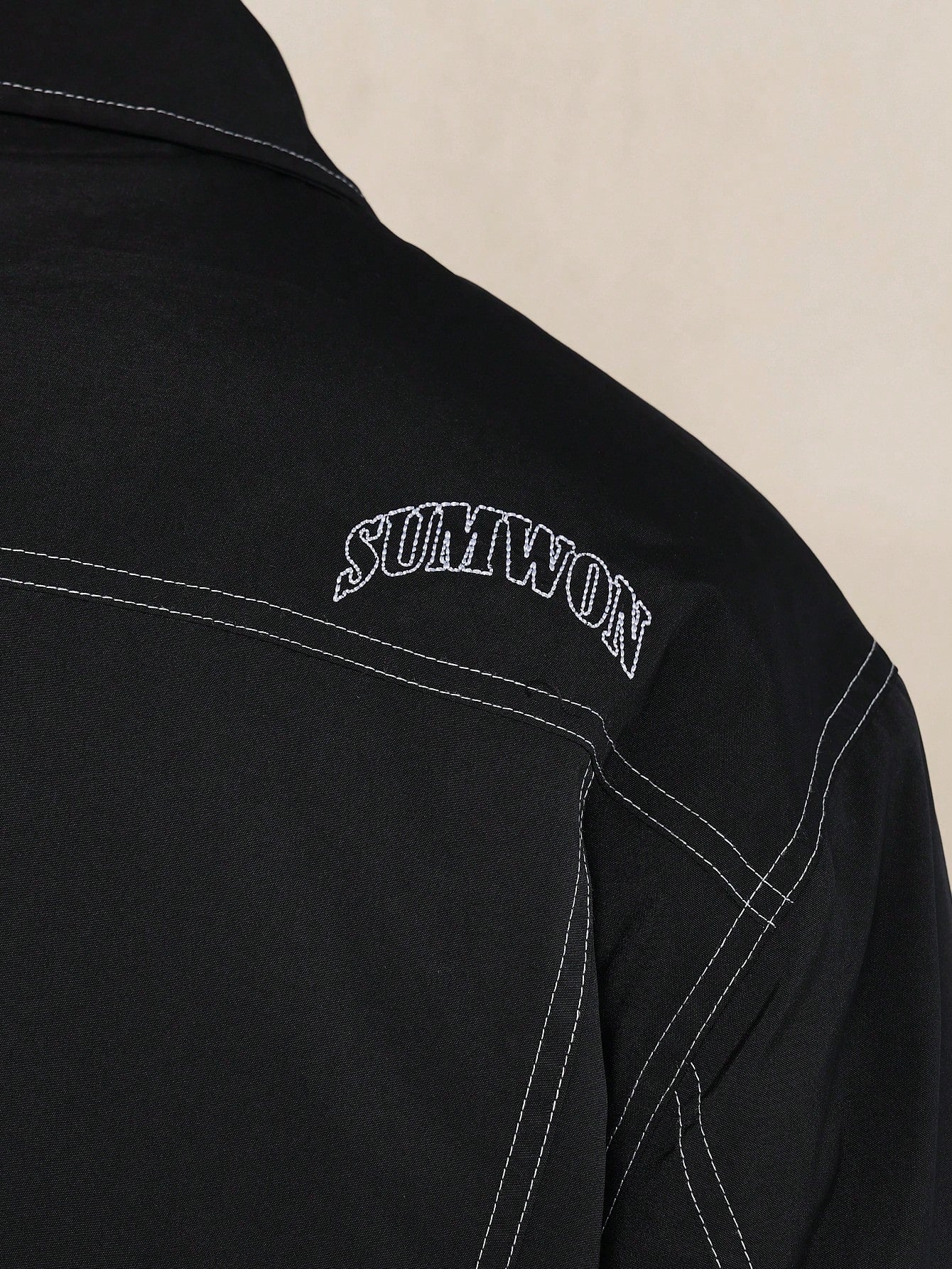 Nylon Trucker Jacket With Contrast Stitching & Embroidery Design