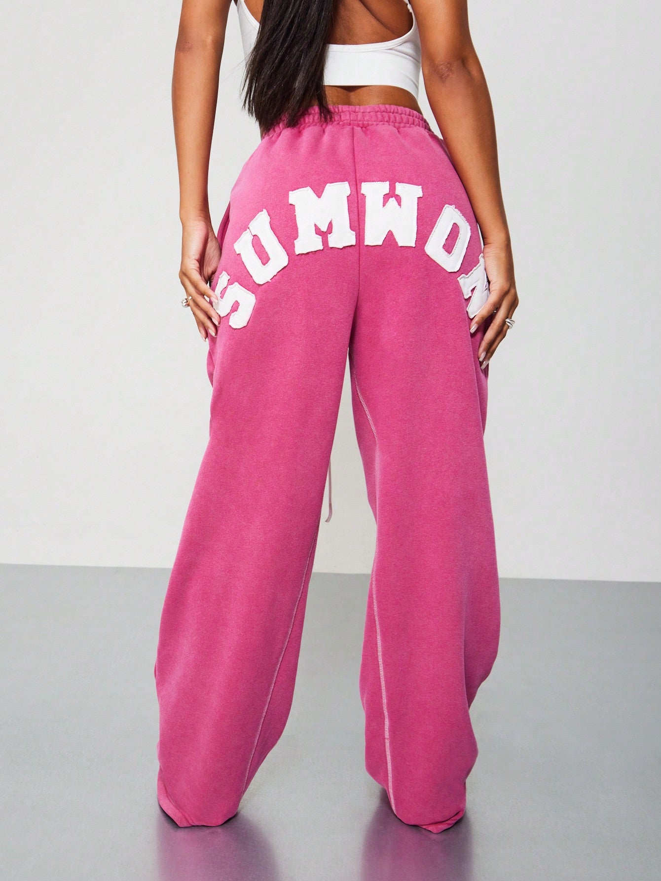 SUMWON WOMEN Wide Leg Washed Sweatpants With Back Applique Design