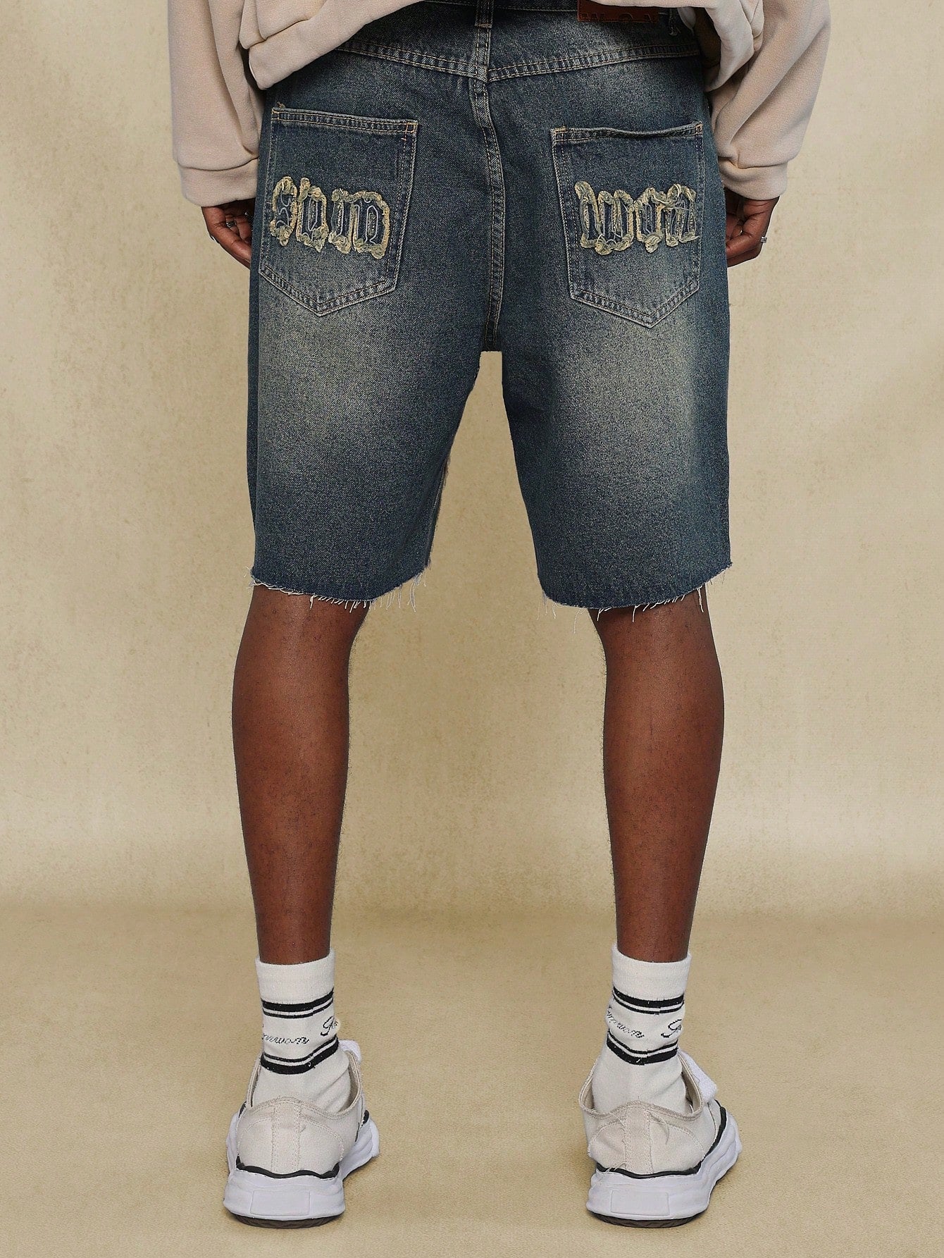 Washed Raw Edge Denim Short With All Over Raw Edge Applique