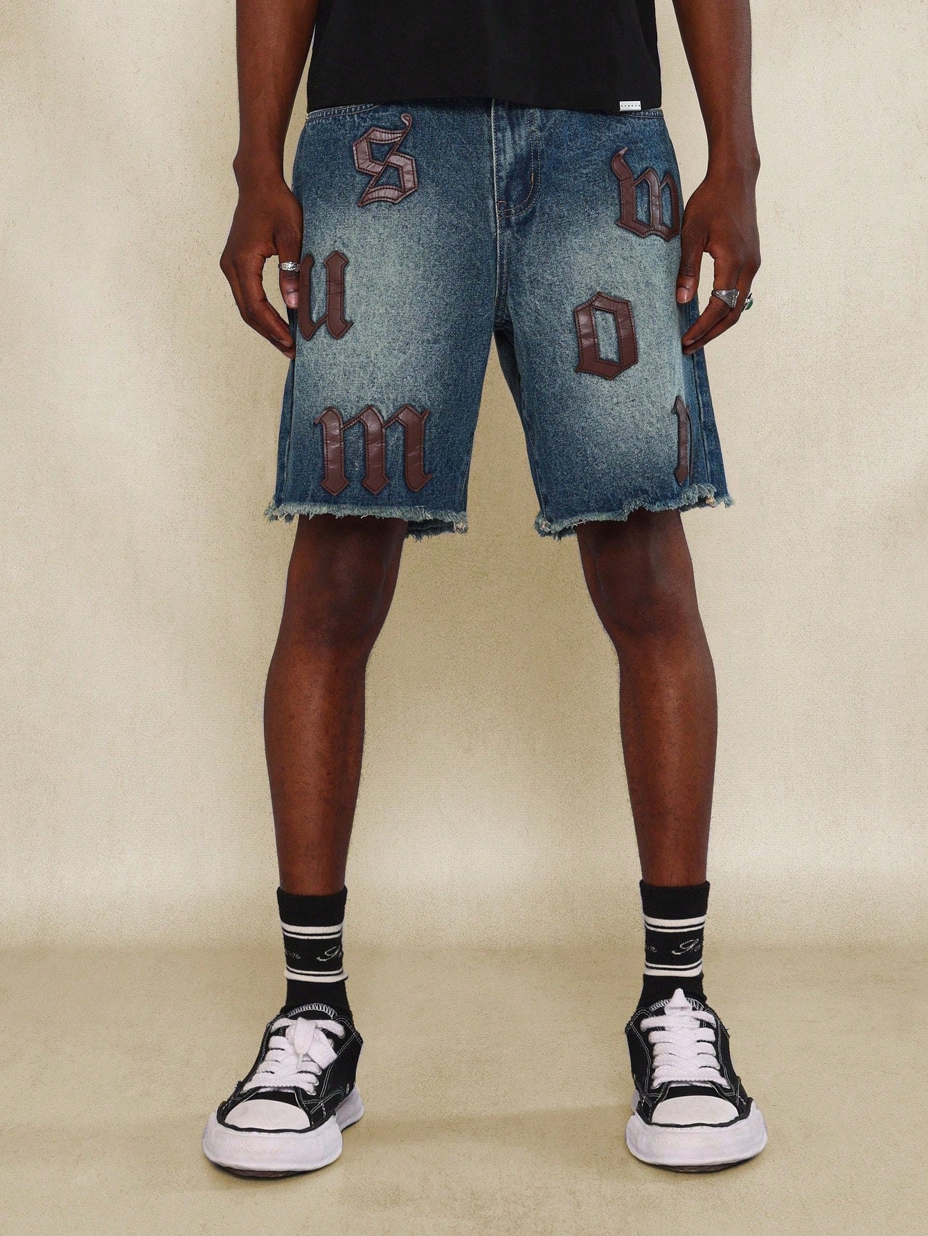 Washed Raw Edge Denim Short With All Over PU Patches