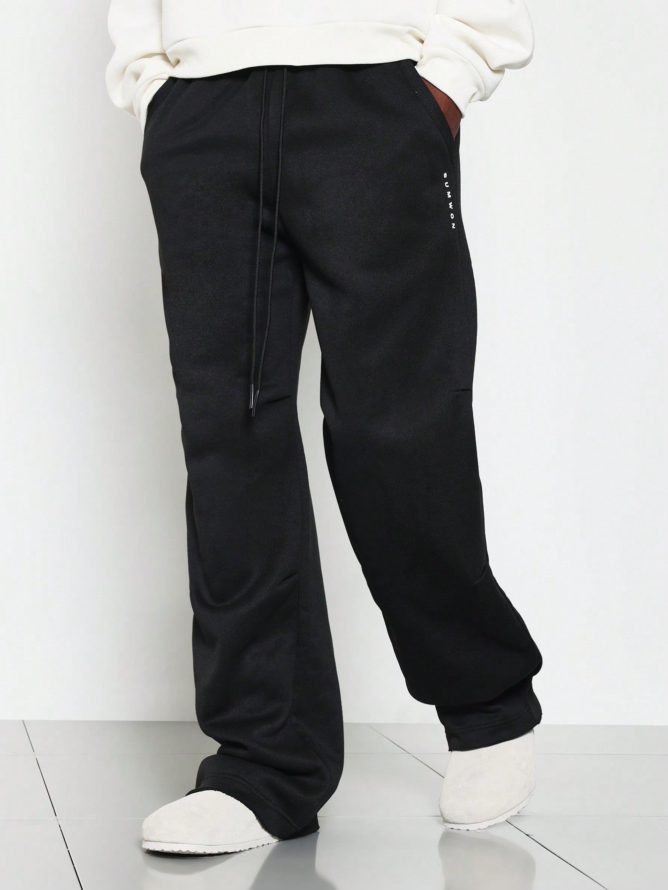 Wide Leg Jogger With Raw Edge Back Pocket Detail