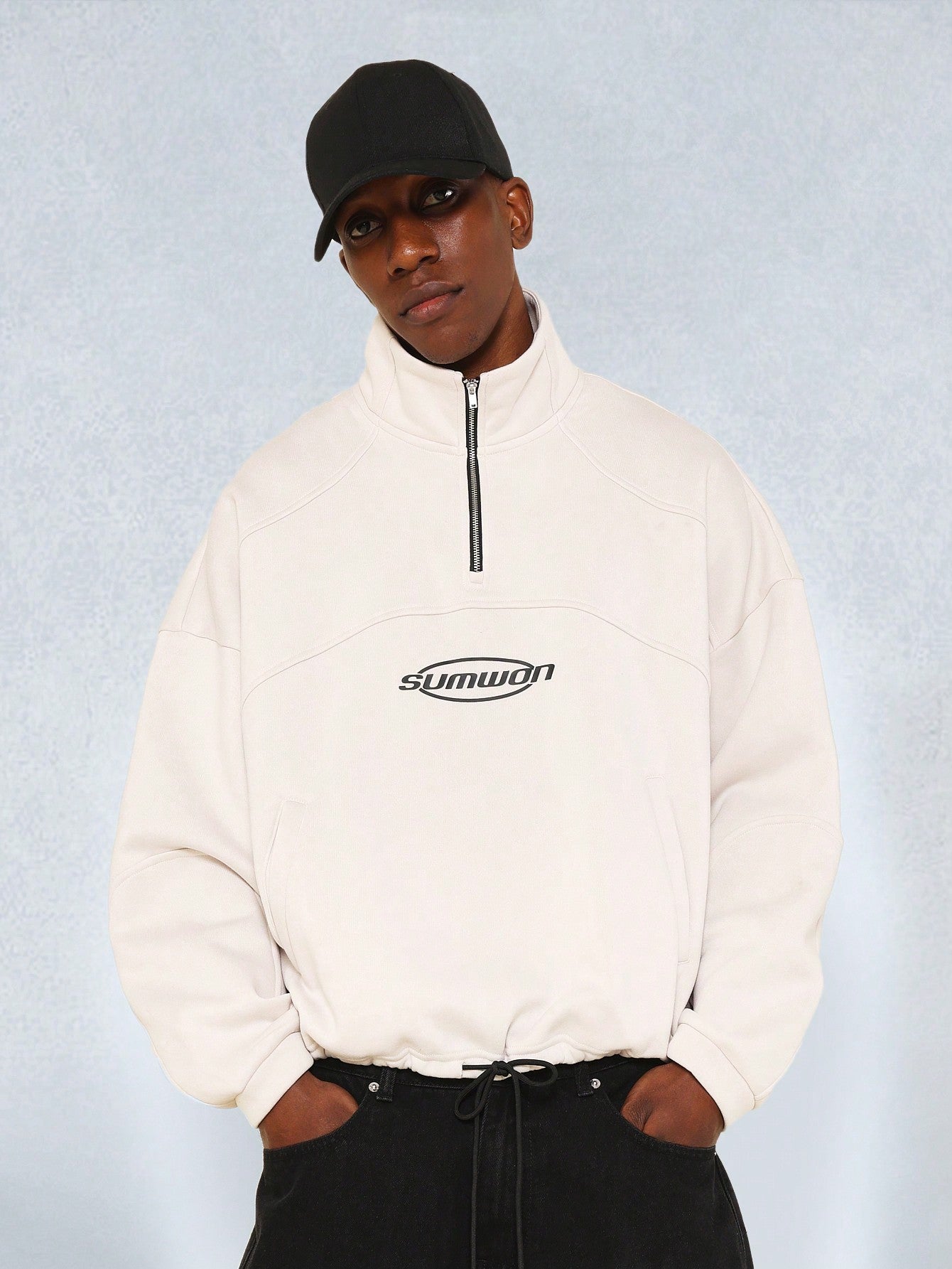 Regular Fit Half Zip Funnel Neck Sweatshirt With Small Graphic Print And Waistband Drawcord